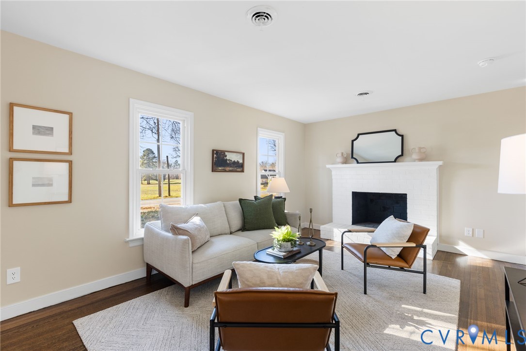 9924 Reams Road Chesterfield, VA 23236 - Photo 14 of 30 a living room with furniture and a fireplace