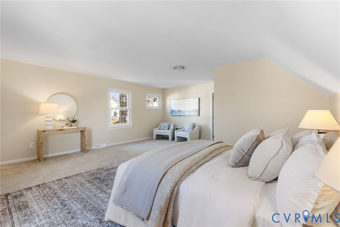 9924 Reams Road Chesterfield, VA 23236 - Photo 21 of 30 a bedroom with a bed and a lamp on dresser