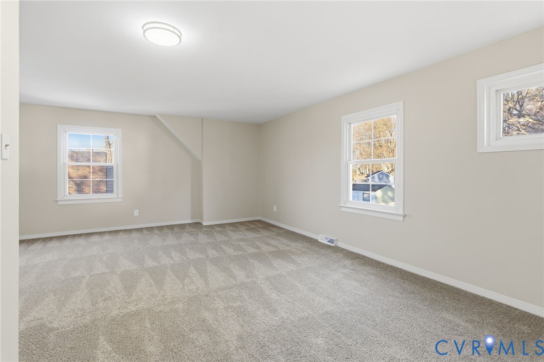 9924 Reams Road Chesterfield, VA 23236 - Photo 23 of 30 an empty room with windows