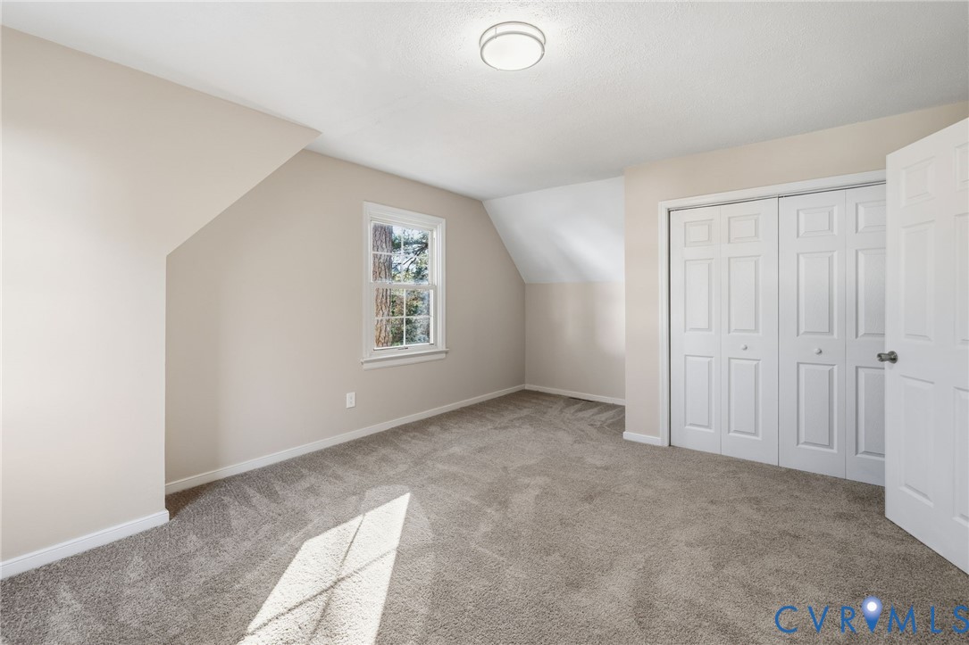 9924 Reams Road Chesterfield, VA 23236 - Photo 24 of 30 an empty room with windows and closet