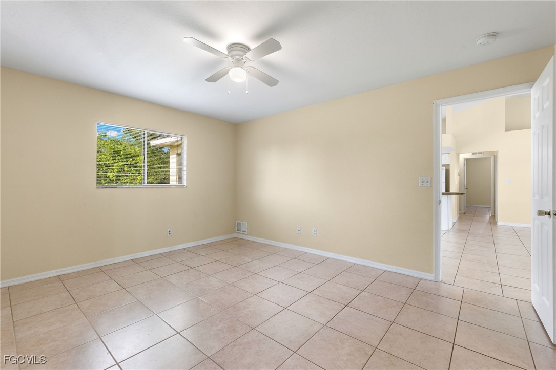 3733 16th Street West Lehigh Acres, FL 33971 - Photo 11 of 25 a view of an empty room with a window