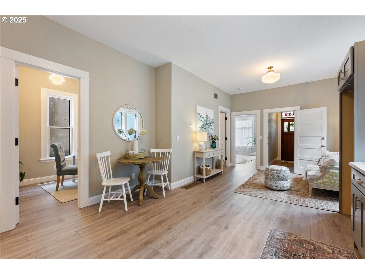 2115 Northwest 22nd Avenue Portland, OR 97210 - Photo 15 of 47 a living room with furniture and wooden floor