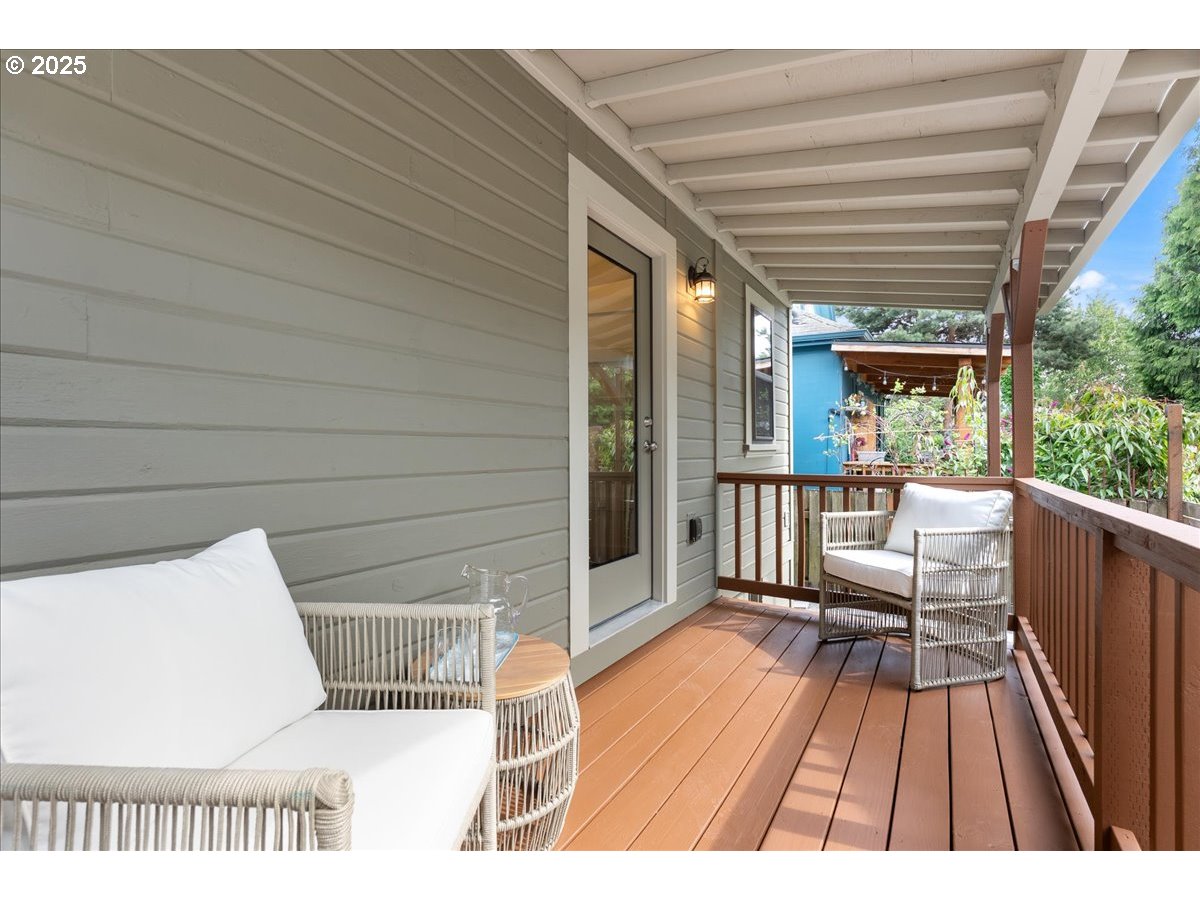 2115 Northwest 22nd Avenue Portland, OR 97210 - Photo 40 of 47 a balcony with wooden floor
