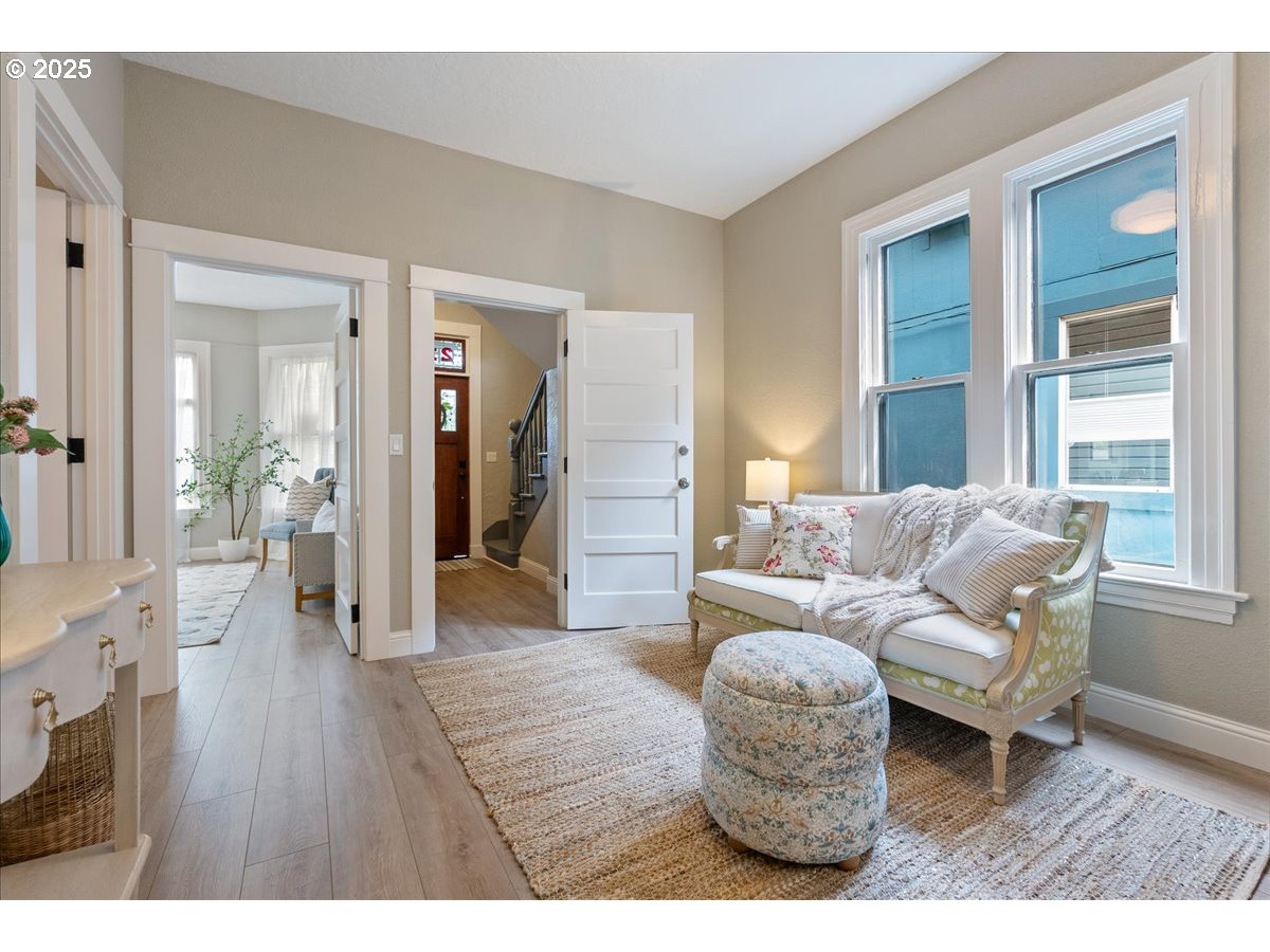 2115 Northwest 22nd Avenue Portland, OR 97210 - Photo 9 of 47 a living room with furniture and a large window