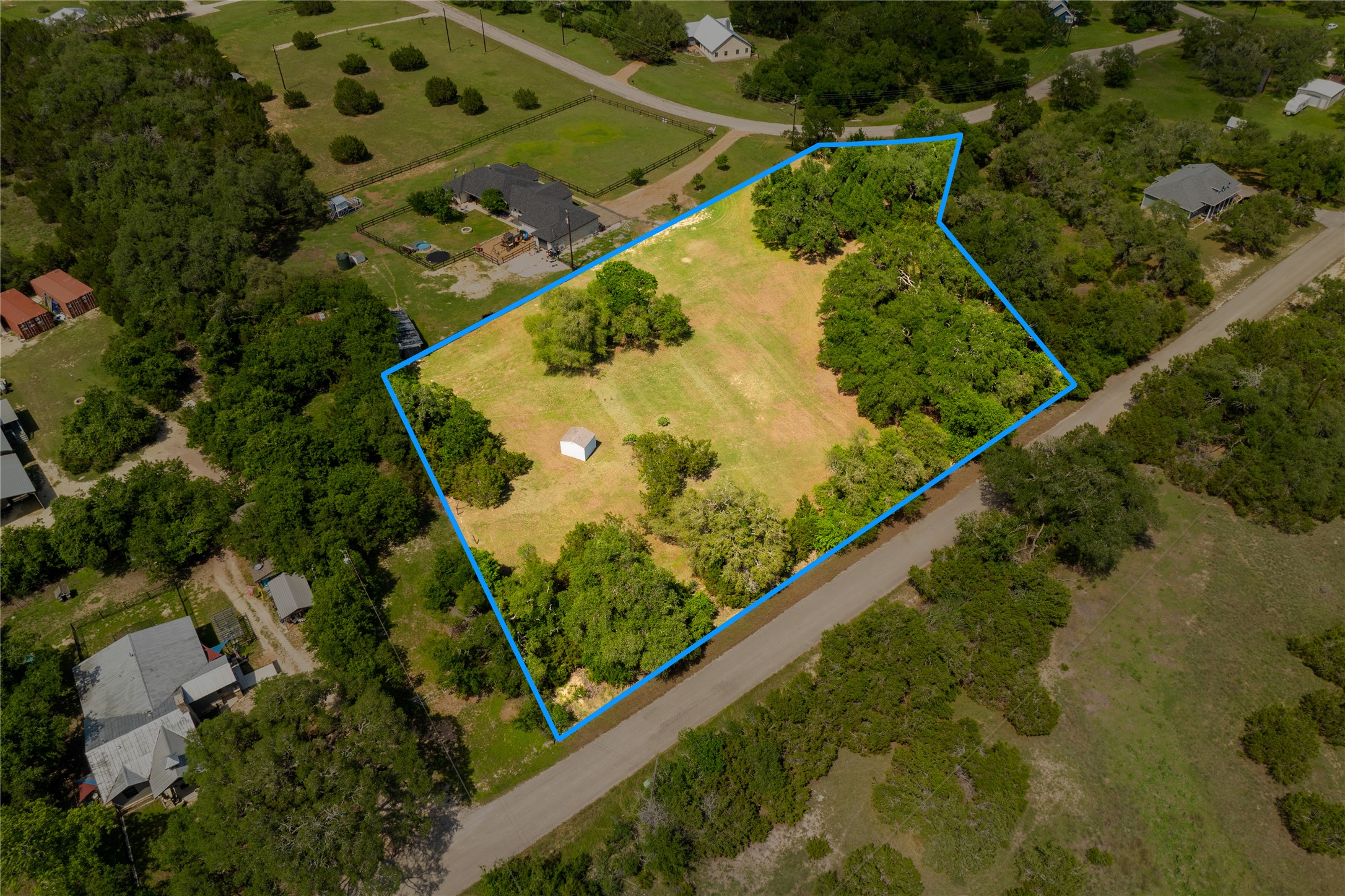 187 Beauchamp Road Dripping Springs, TX 78620 - Photo 11 of 19 Expansive land parcel featuring a mix of open areas and mature tree coverage