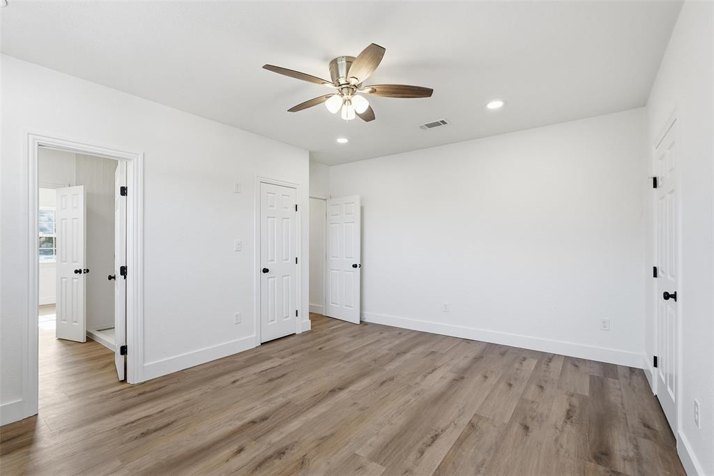 9938 John Flowers Road Wills Point, TX 75169 - Photo 32 of 40 Upstairs bedroom with light wood-style floors, ceiling fan, and recessed lighting