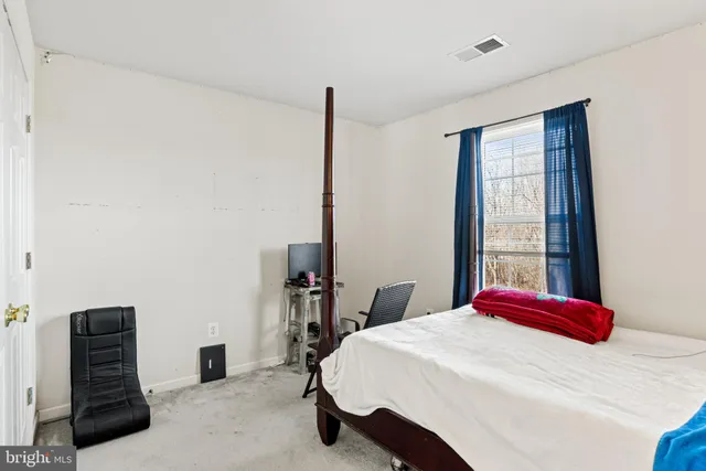 a bathroom with a sink vanity and a mirror