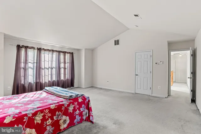 a bathroom with a bathtub and a sink