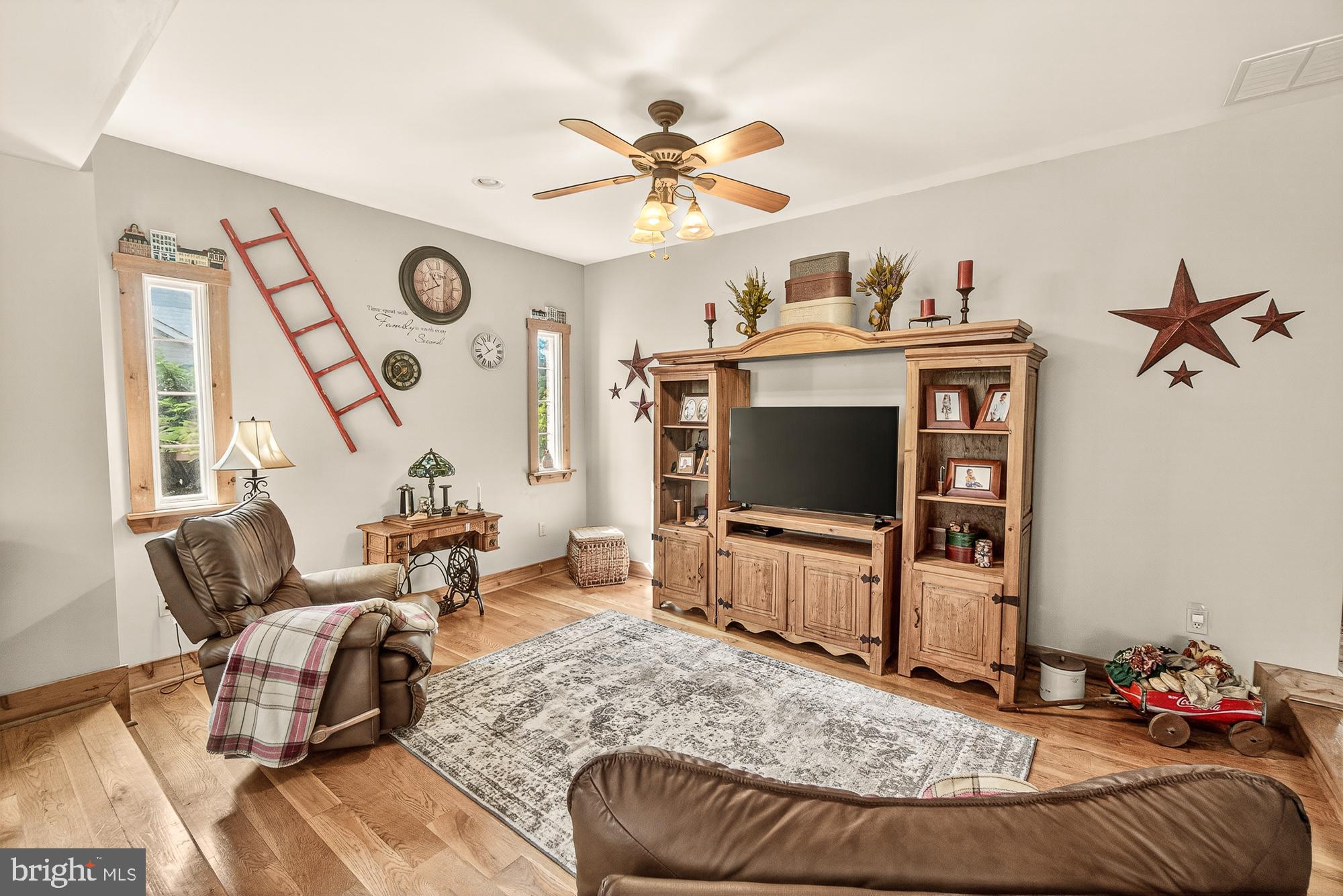 4948 Teen Barnes Road Frederick, MD 21703 - Photo 26 of 56 a living room with furniture and a flat screen tv