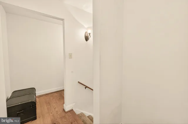 a kitchen with a stove and cabinets