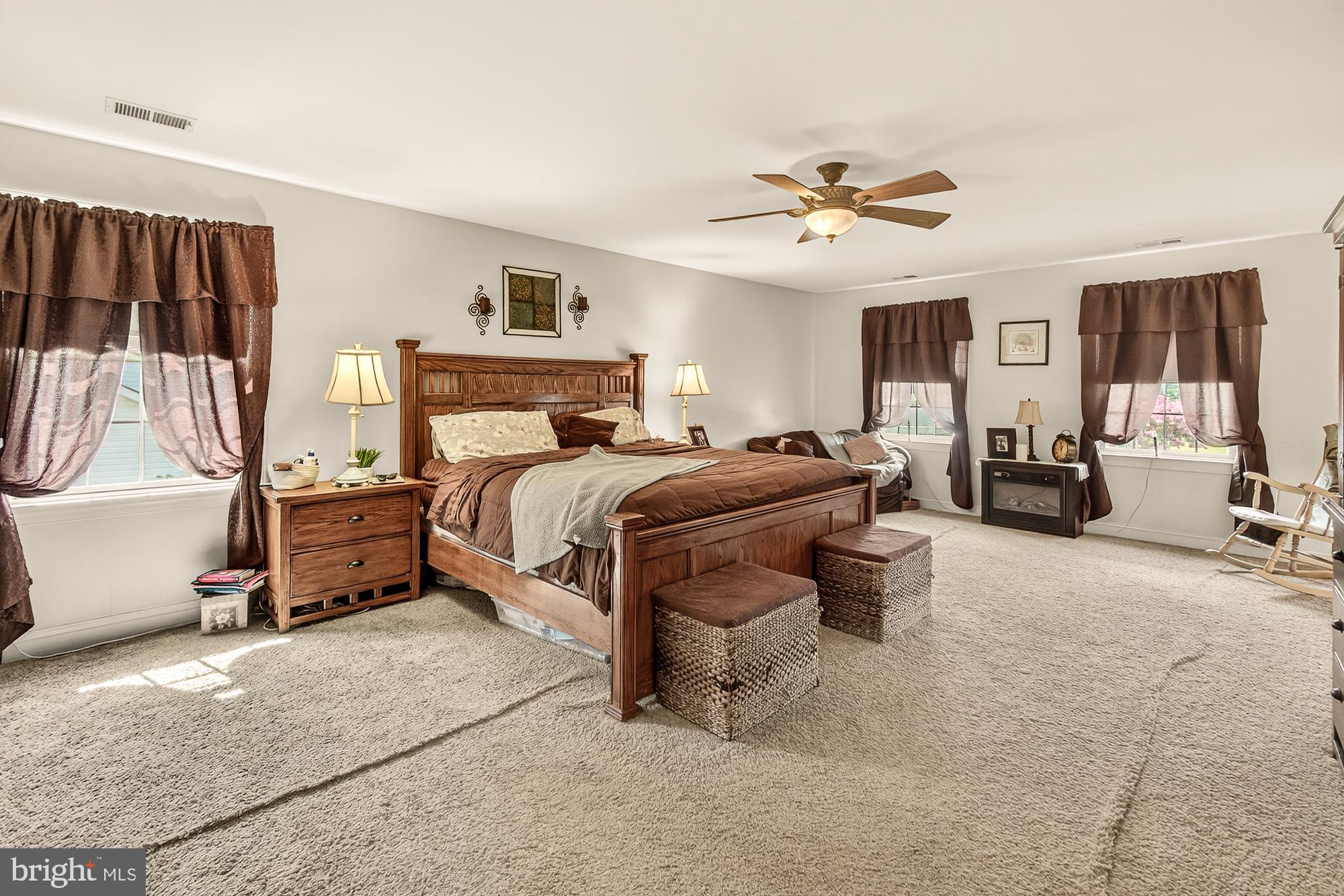 4948 Teen Barnes Road Frederick, MD 21703 - Photo 37 of 56 a bed room with a bed and a couch