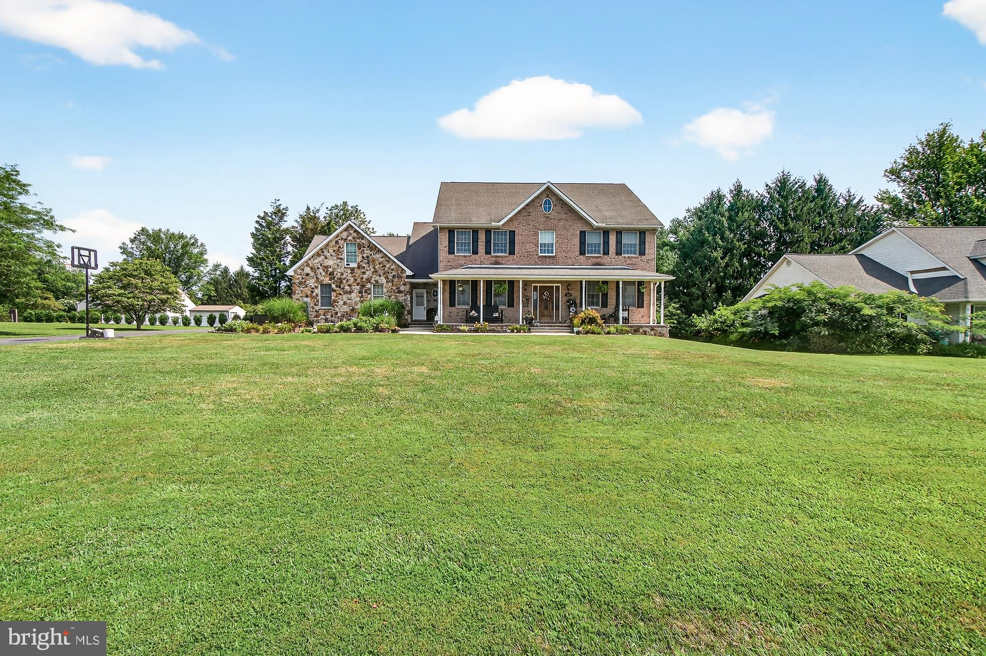 4948 Teen Barnes Road Frederick, MD 21703 - Photo 52 of 56 a view of a house with a yard