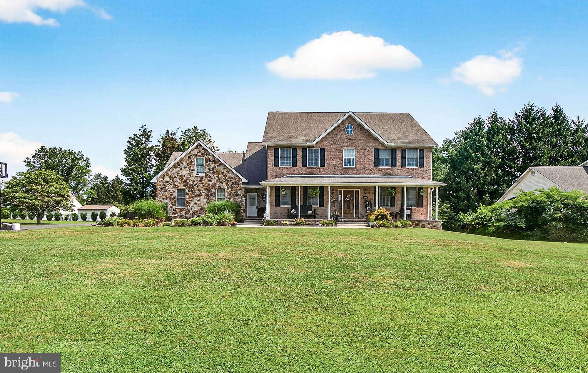 4948 Teen Barnes Road Frederick, MD 21703 - Photo 53 of 56 a front view of a house with a garden