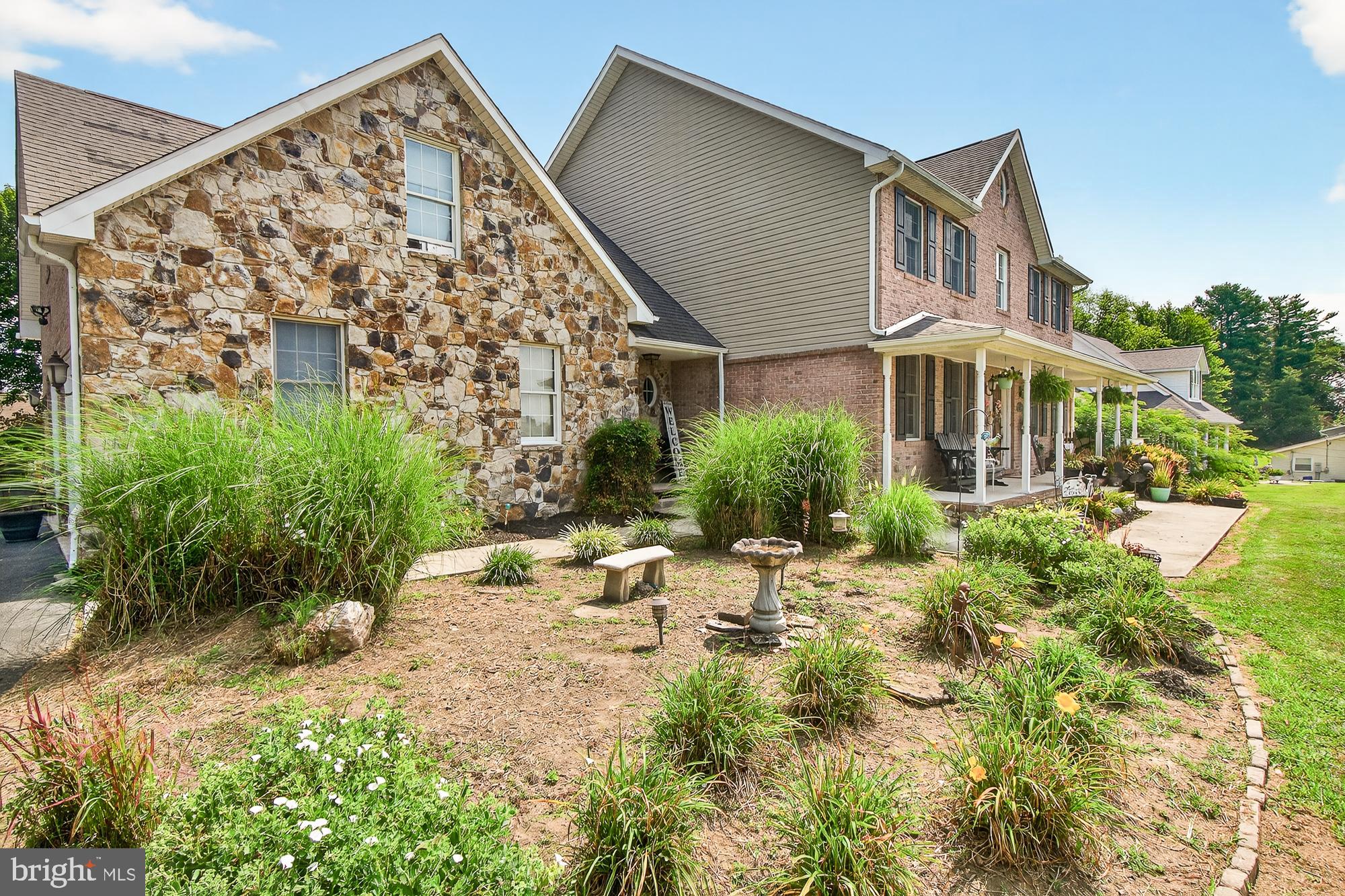 4948 Teen Barnes Road Frederick, MD 21703 - Photo 6 of 56 a view of a house with a yard