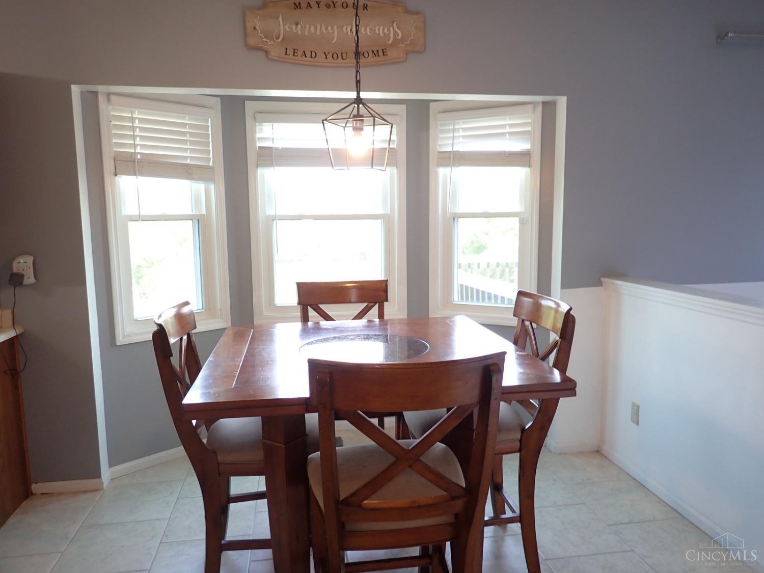 7850 Morris Road Hamilton, OH 45011 - Photo 13 of 52 Breakfast Nook with Tile flooring between Kitchen and Family Room.