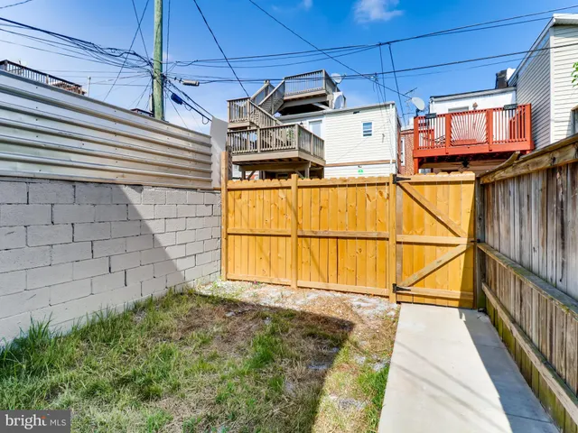 a view of a backyard of a house