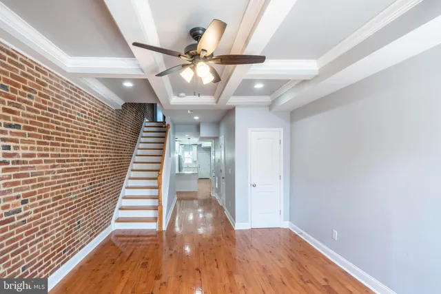 a view of entryway with wooden floor
