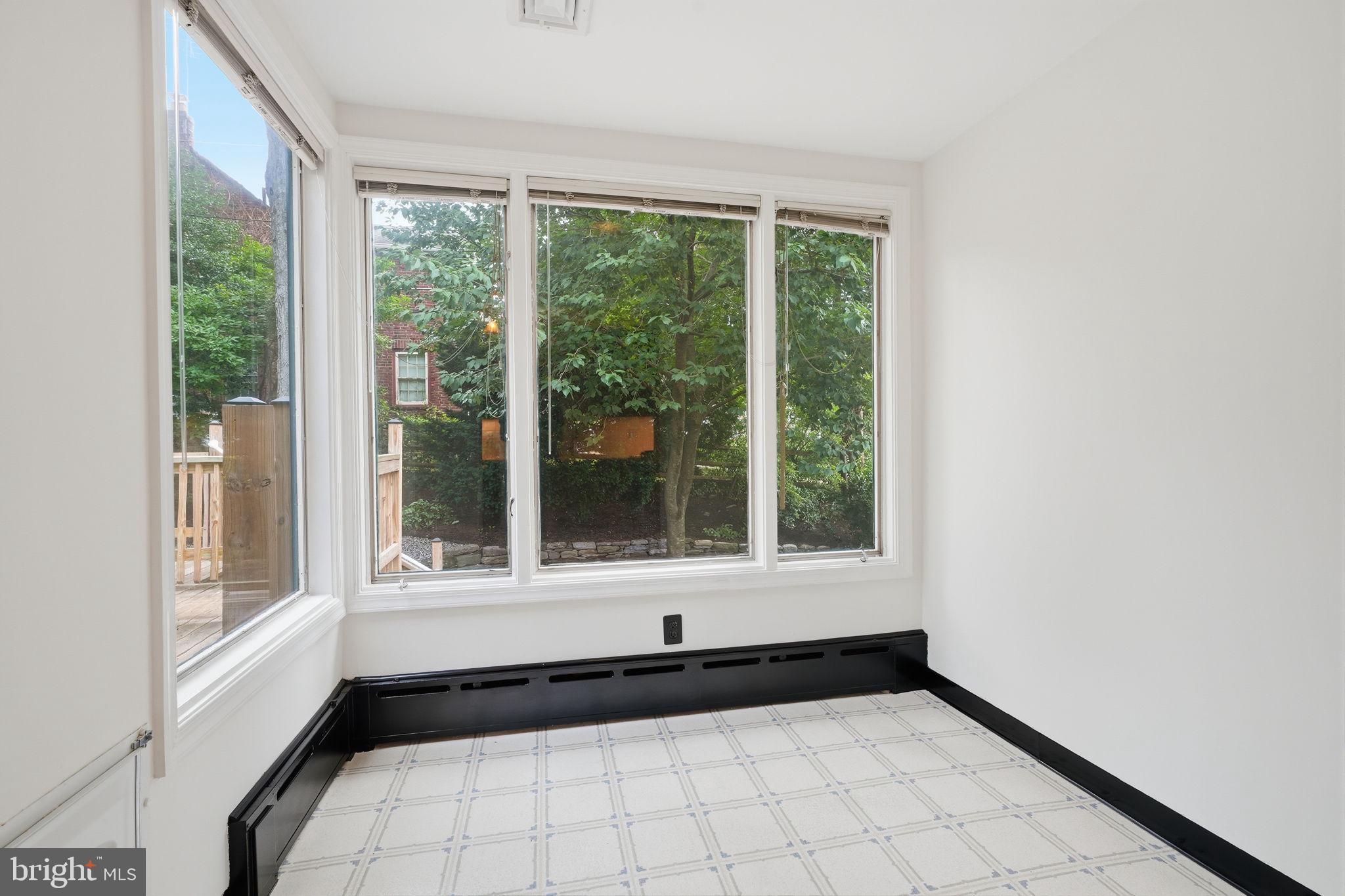 404 Old Farm Road Wyncote, PA 19095 - Photo 18 of 41 Bright sunlit room with garden views.
