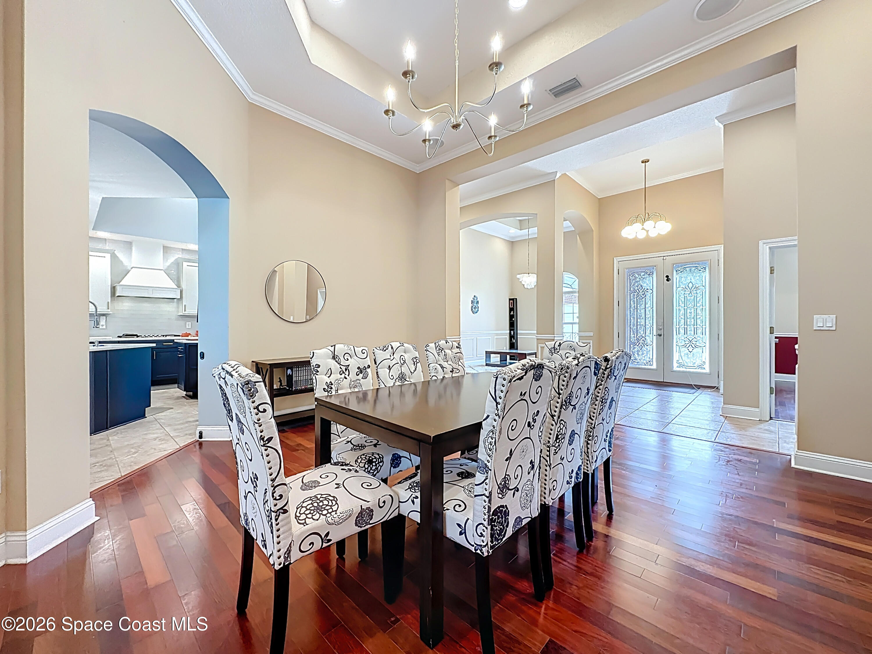 2851 Armsdale Road Jacksonville, FL 32218 - Photo 13 of 89 a view of a dining room with furniture and wooden floor