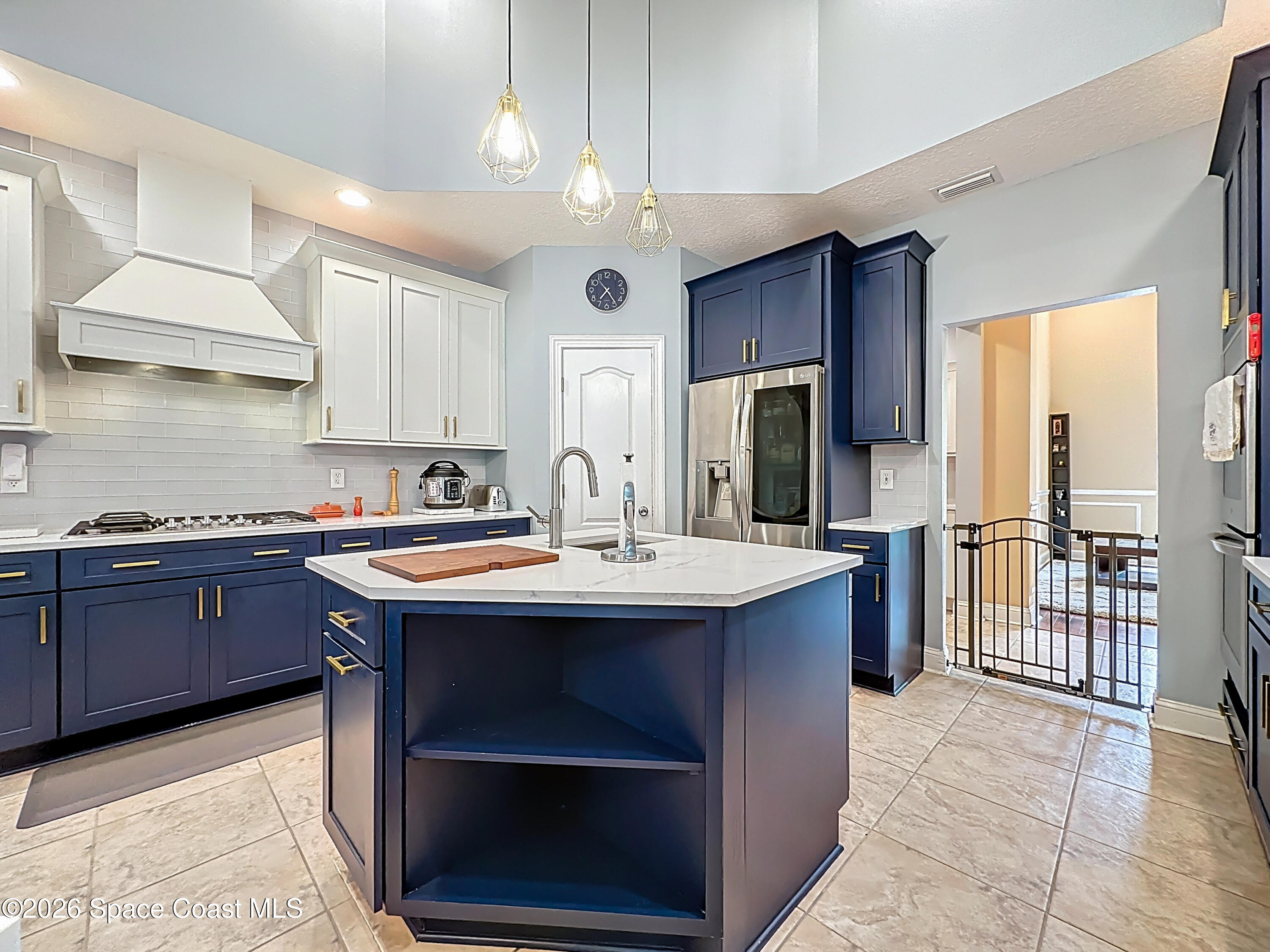 2851 Armsdale Road Jacksonville, FL 32218 - Photo 14 of 89 a kitchen with stainless steel appliances granite countertop a sink a stove a refrigerator and island