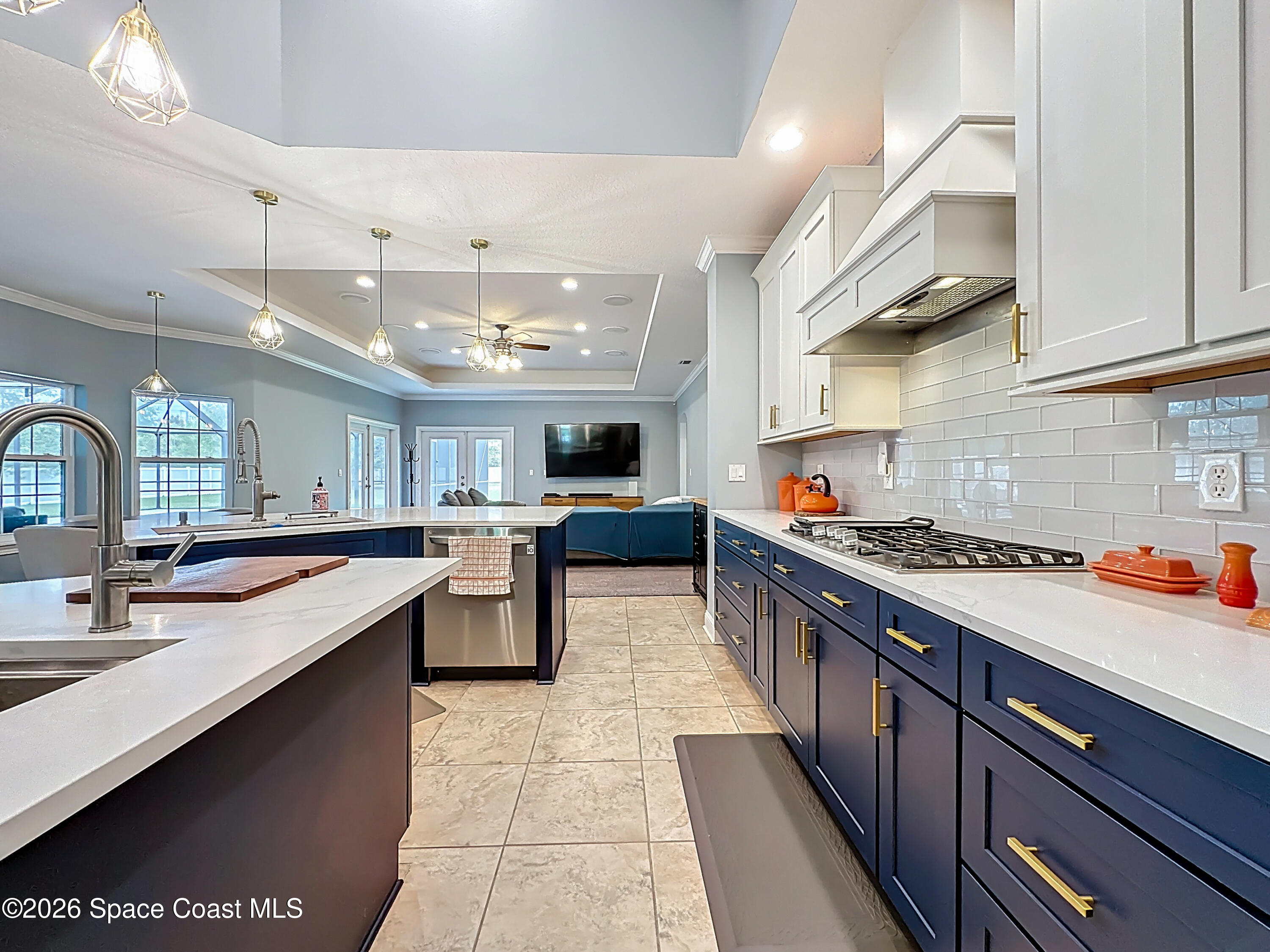 2851 Armsdale Road Jacksonville, FL 32218 - Photo 16 of 89 a large kitchen with stainless steel appliances a stove a sink dishwasher and cabinets with wooden floor