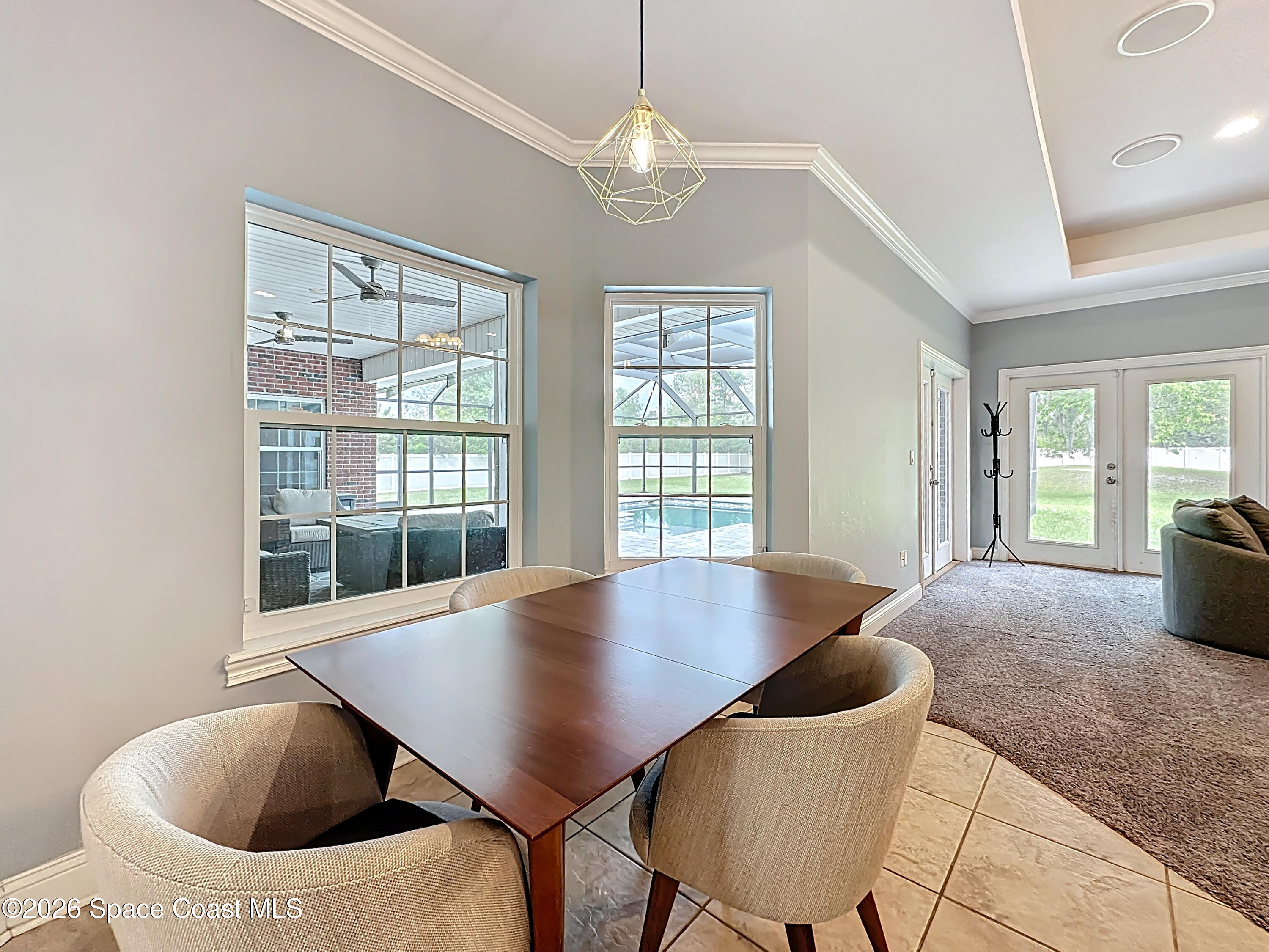 2851 Armsdale Road Jacksonville, FL 32218 - Photo 20 of 89 a view of a dining room with furniture and window