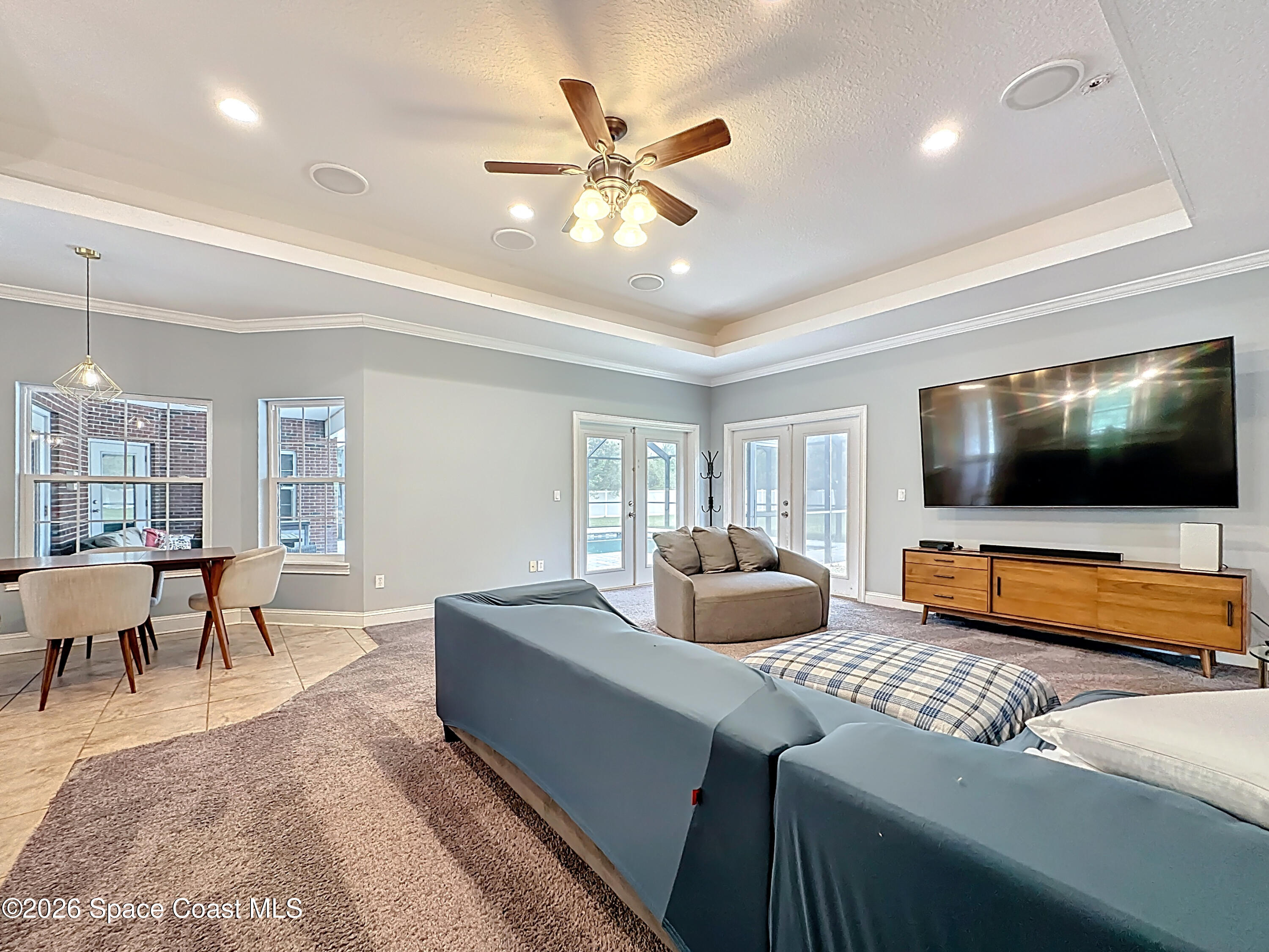 2851 Armsdale Road Jacksonville, FL 32218 - Photo 21 of 89 a living room with furniture and a flat screen tv