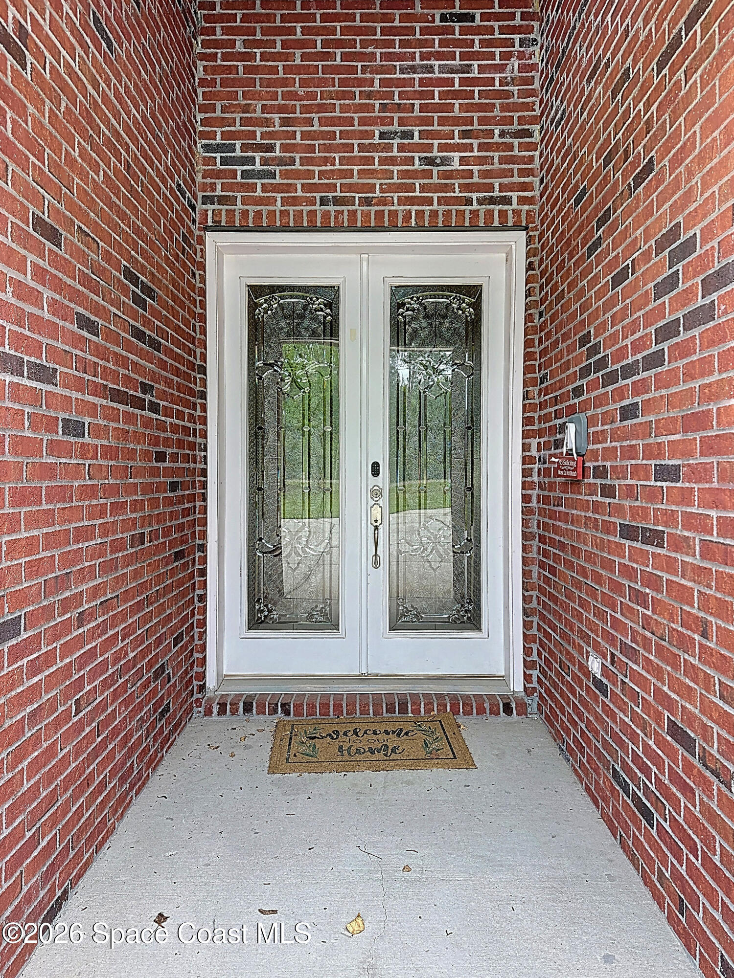 2851 Armsdale Road Jacksonville, FL 32218 - Photo 4 of 89 a view of a brick house with a large window