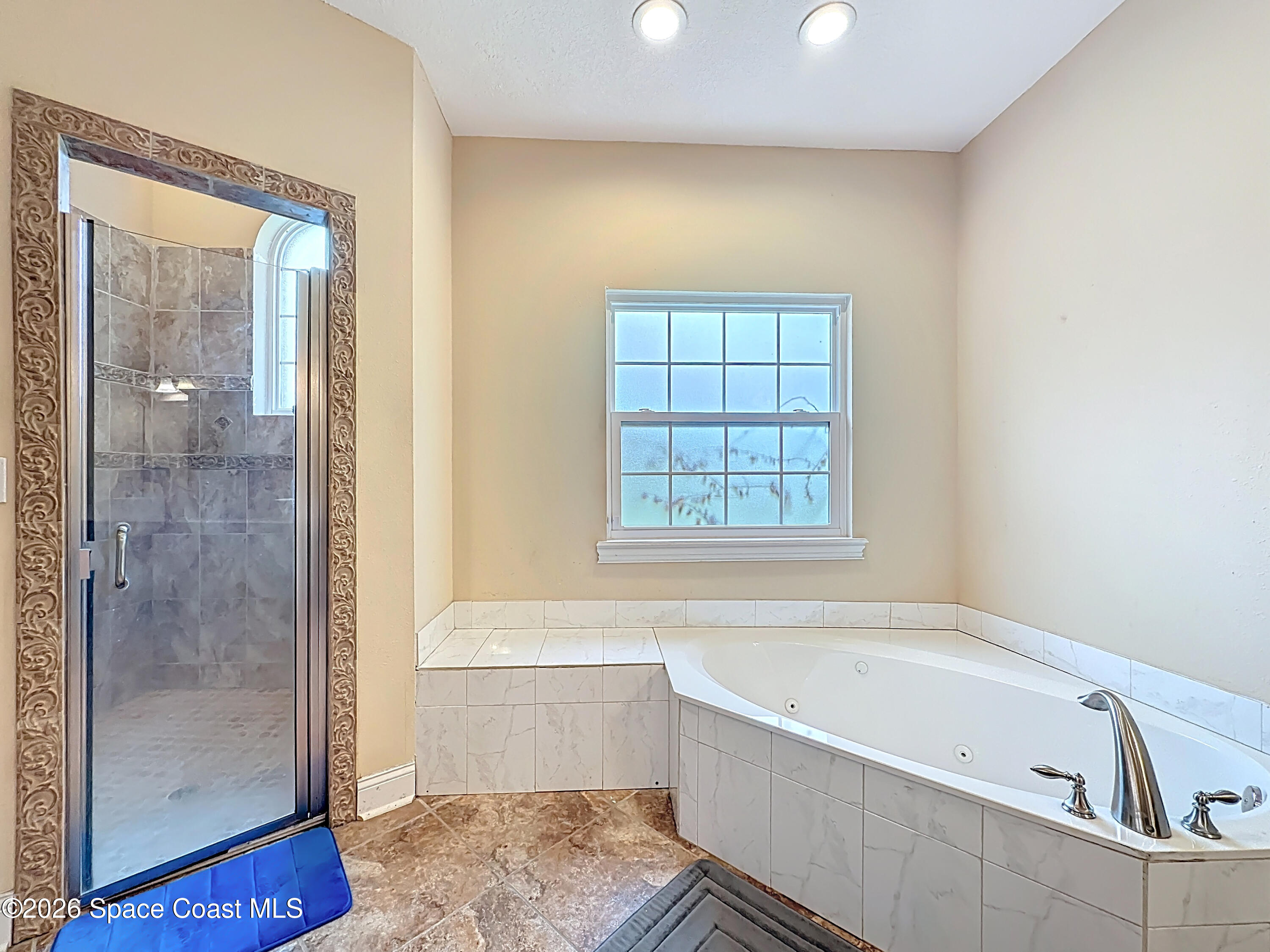 2851 Armsdale Road Jacksonville, FL 32218 - Photo 45 of 89 a bathroom with a bathtub a toilet and a shower