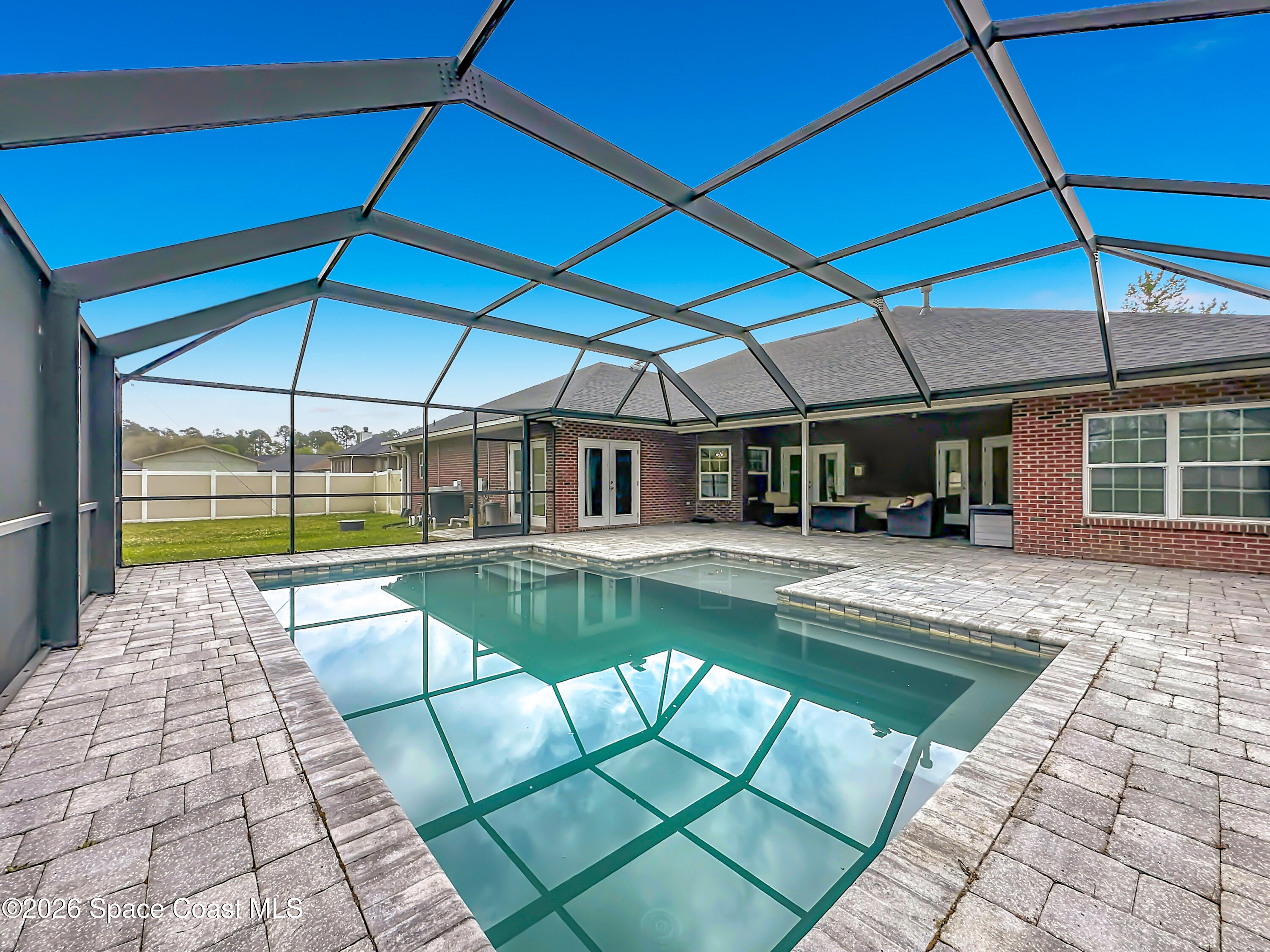 2851 Armsdale Road Jacksonville, FL 32218 - Photo 61 of 89 a view of a swimming pool with a patio