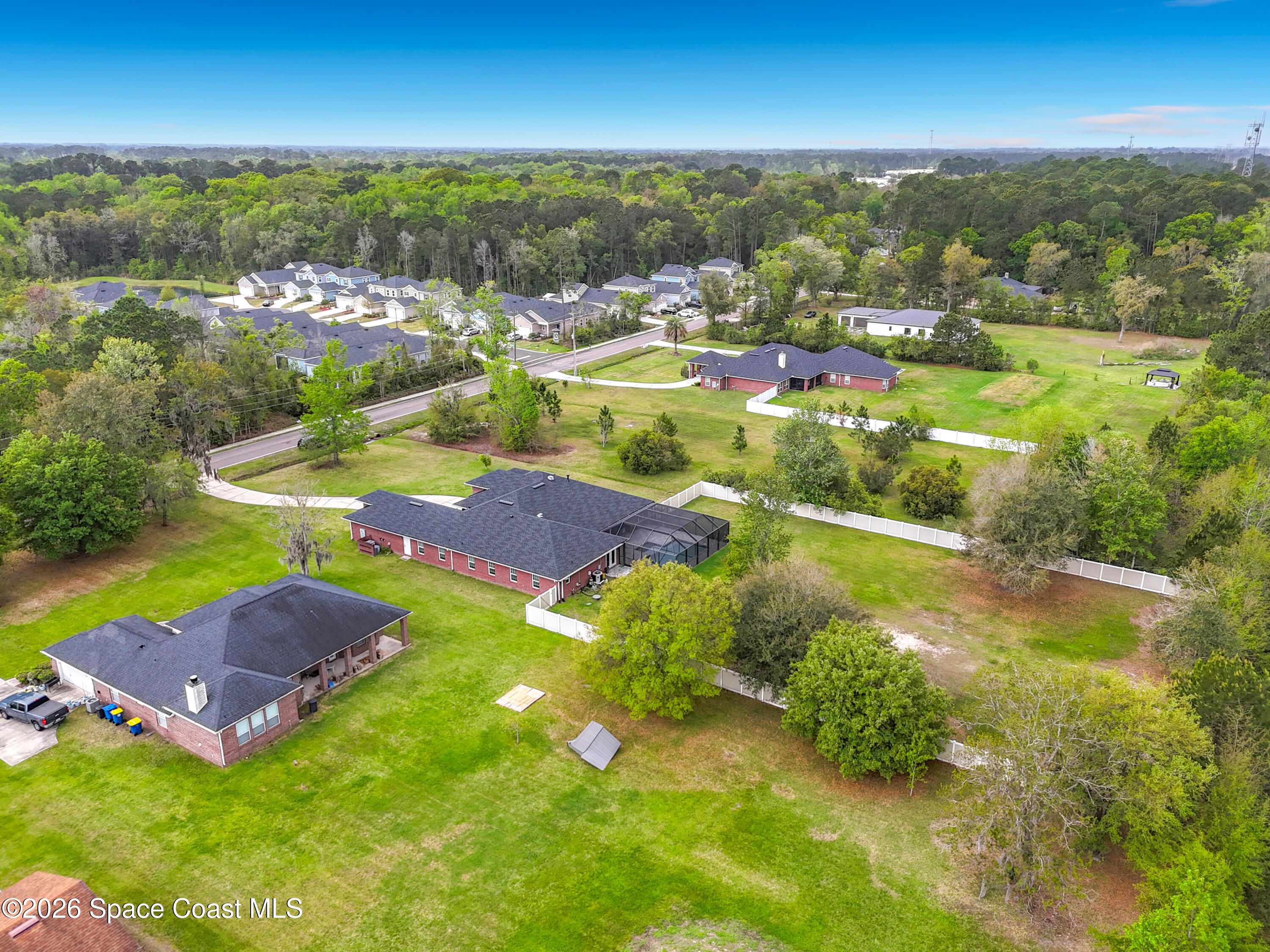 2851 Armsdale Road Jacksonville, FL 32218 - Photo 85 of 89 an aerial view of residential houses with outdoor space and street view