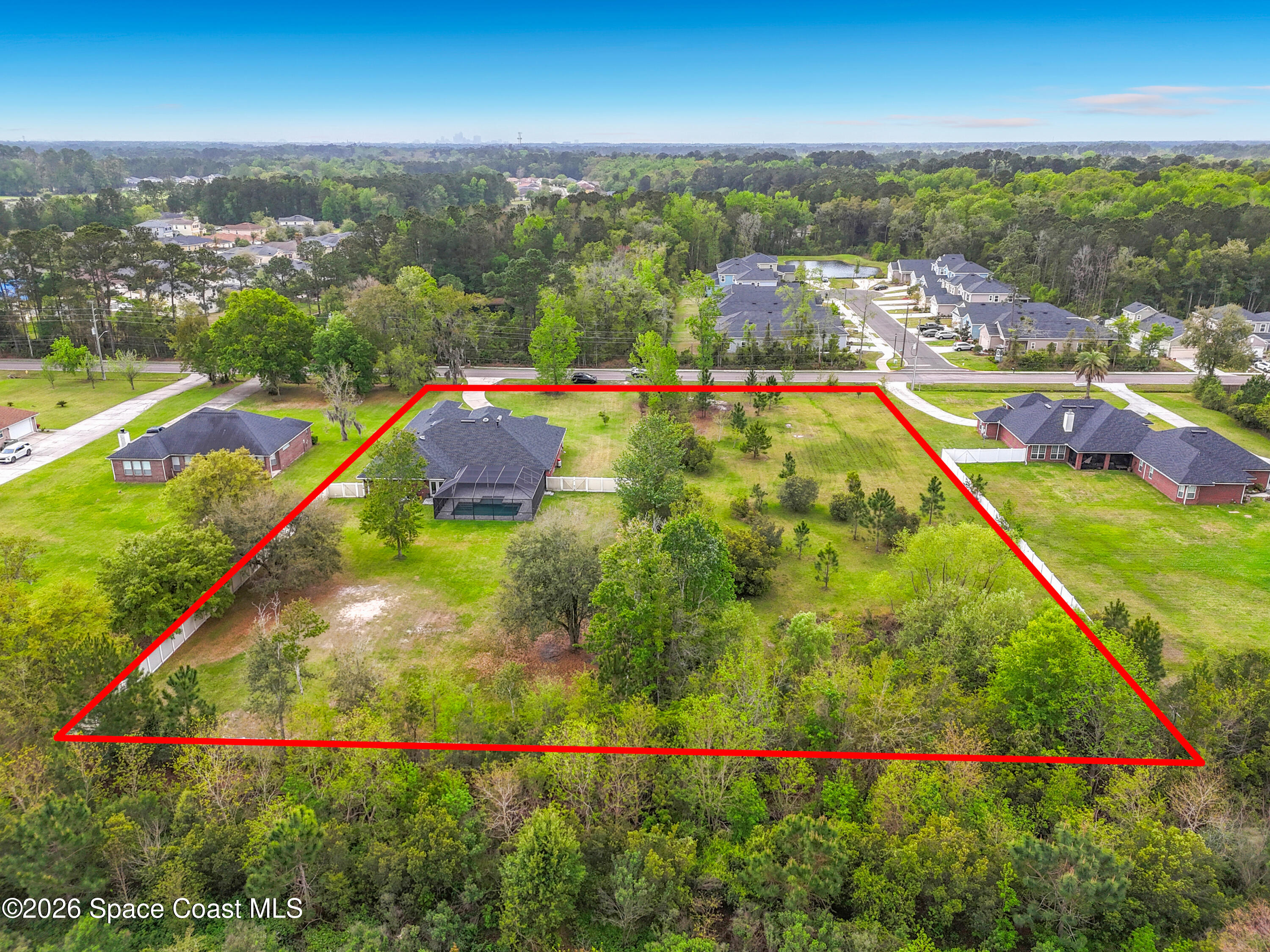 2851 Armsdale Road Jacksonville, FL 32218 - Photo 89 of 89 an aerial view of residential houses with outdoor space and swimming pool