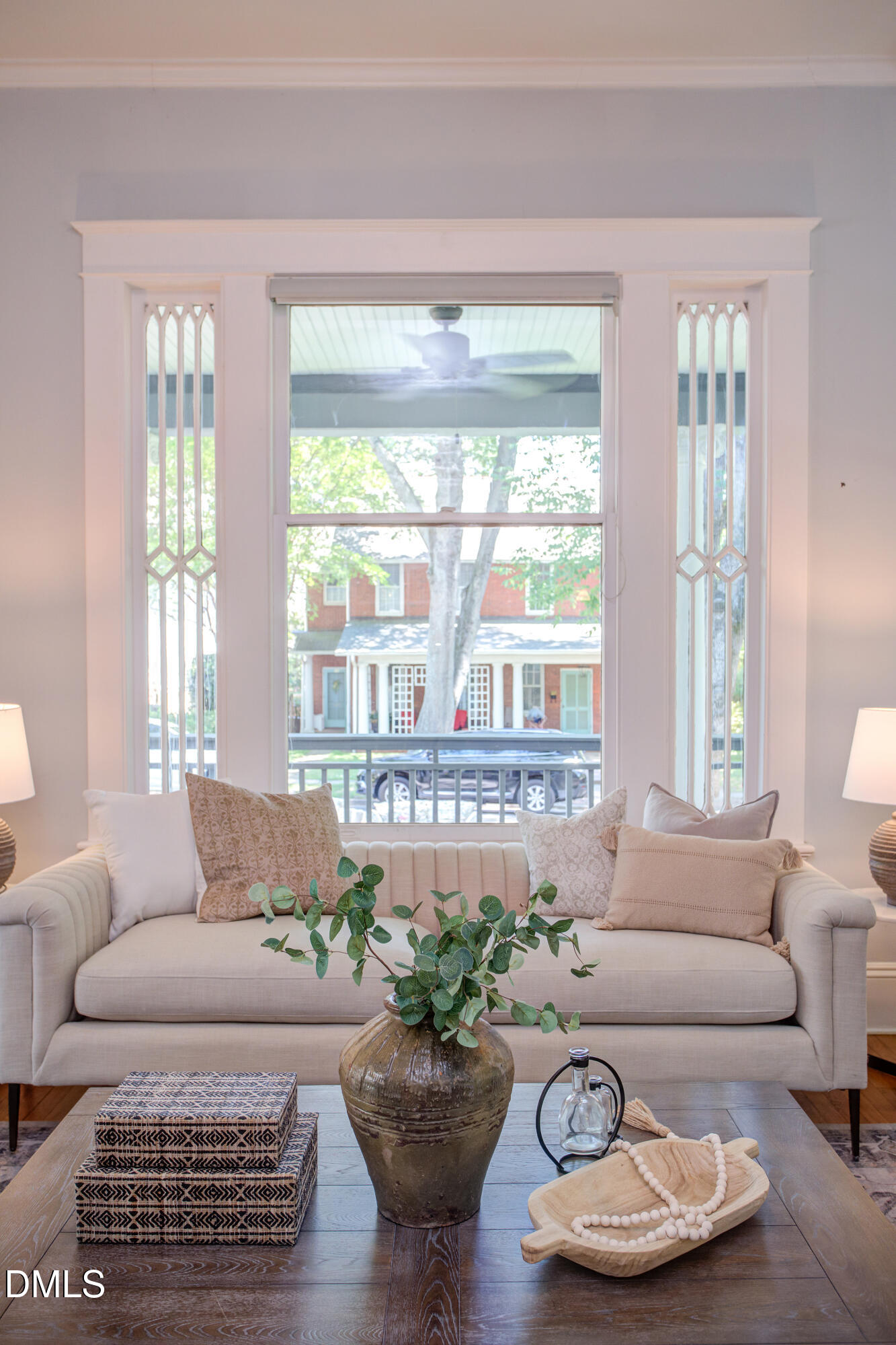 127 Forest Road Raleigh, NC 27605 - Photo 11 of 75 a living room with furniture and a large window