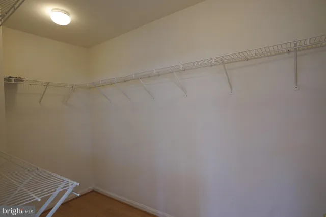 a view of a room with racks on the wall
