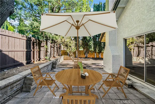 swimming pool view with a seating space