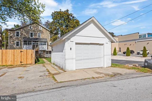a view of a house with a street