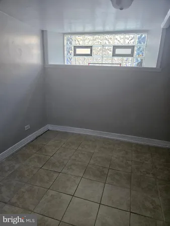 a view of a window in an empty room