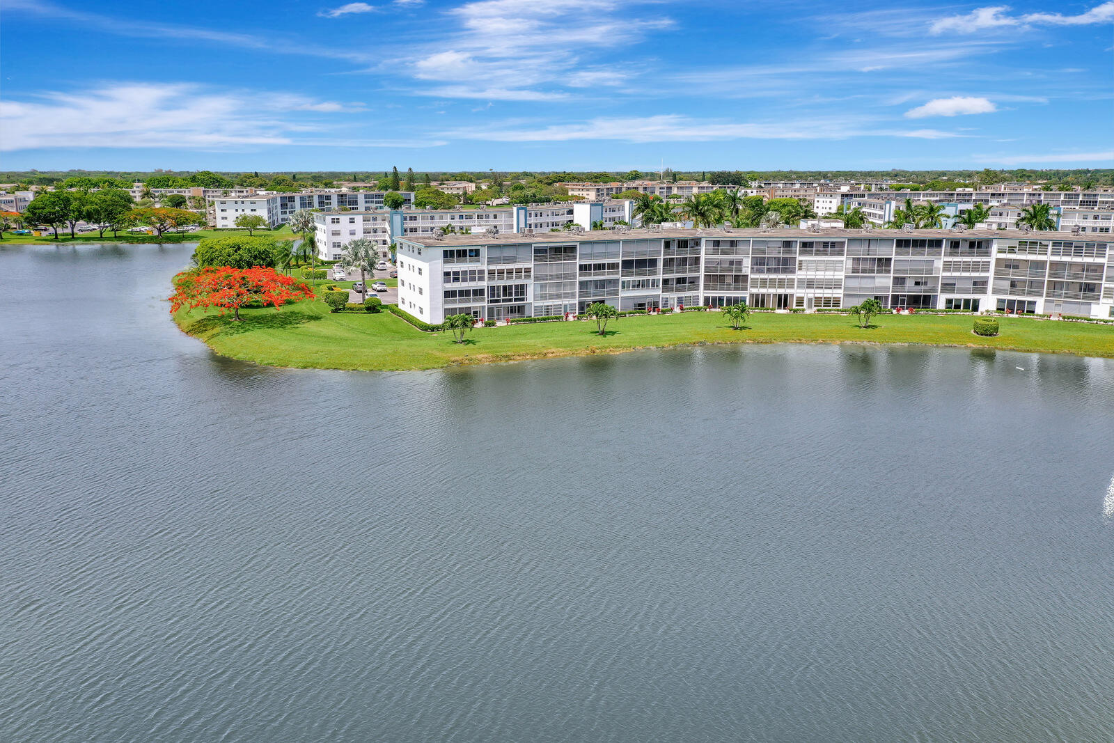 4063 Exeter Boca Raton, FL 33434 - Photo 47 of 55 a view of a lake with a city