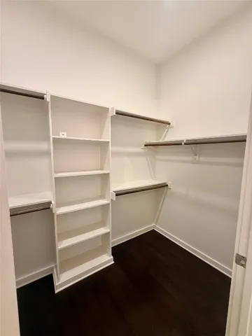 a storage room with wooden floor