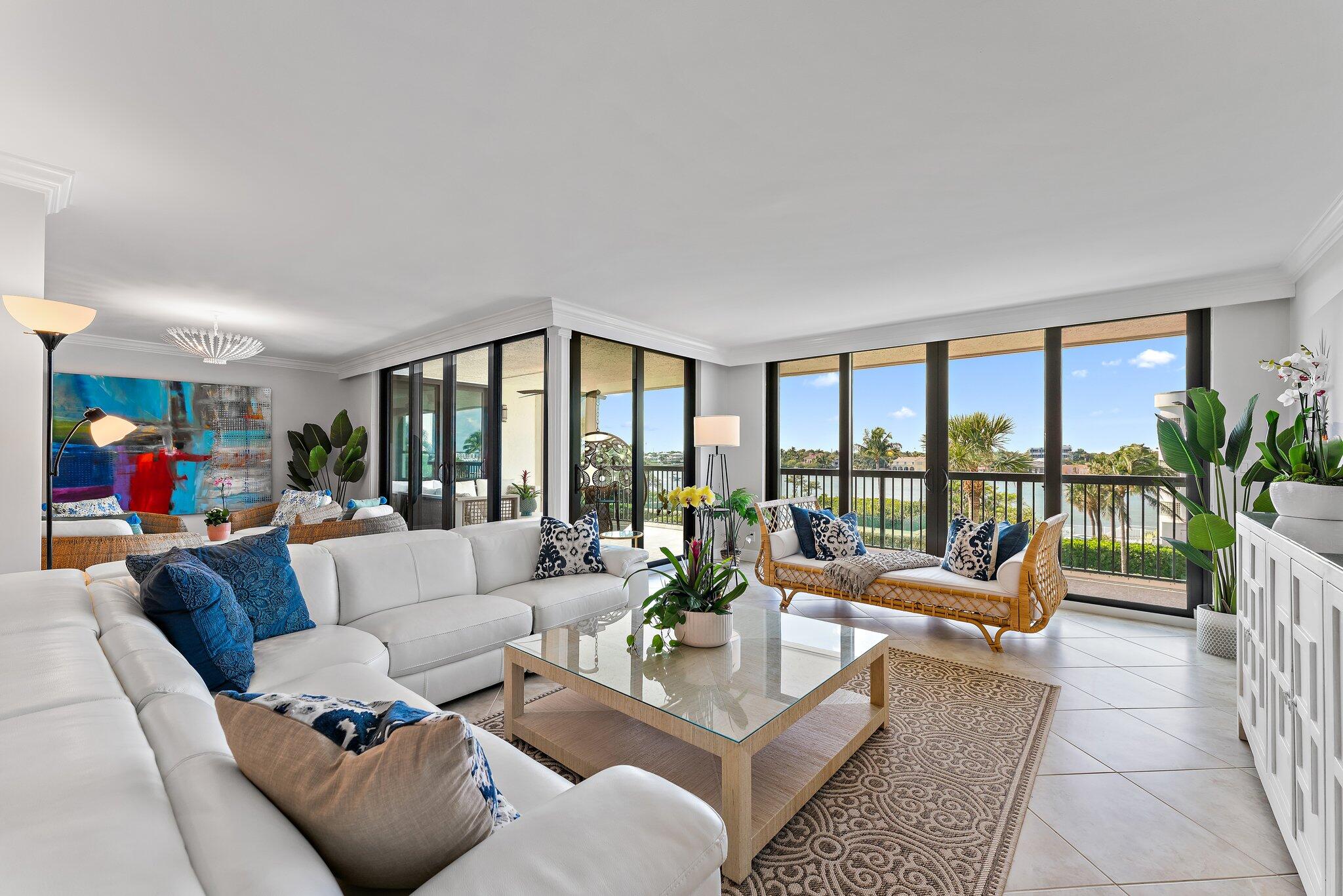 19670 South Beach Road, Unit B303 Jupiter, FL 33469 - Photo 15 of 104 a living room with furniture and a large window