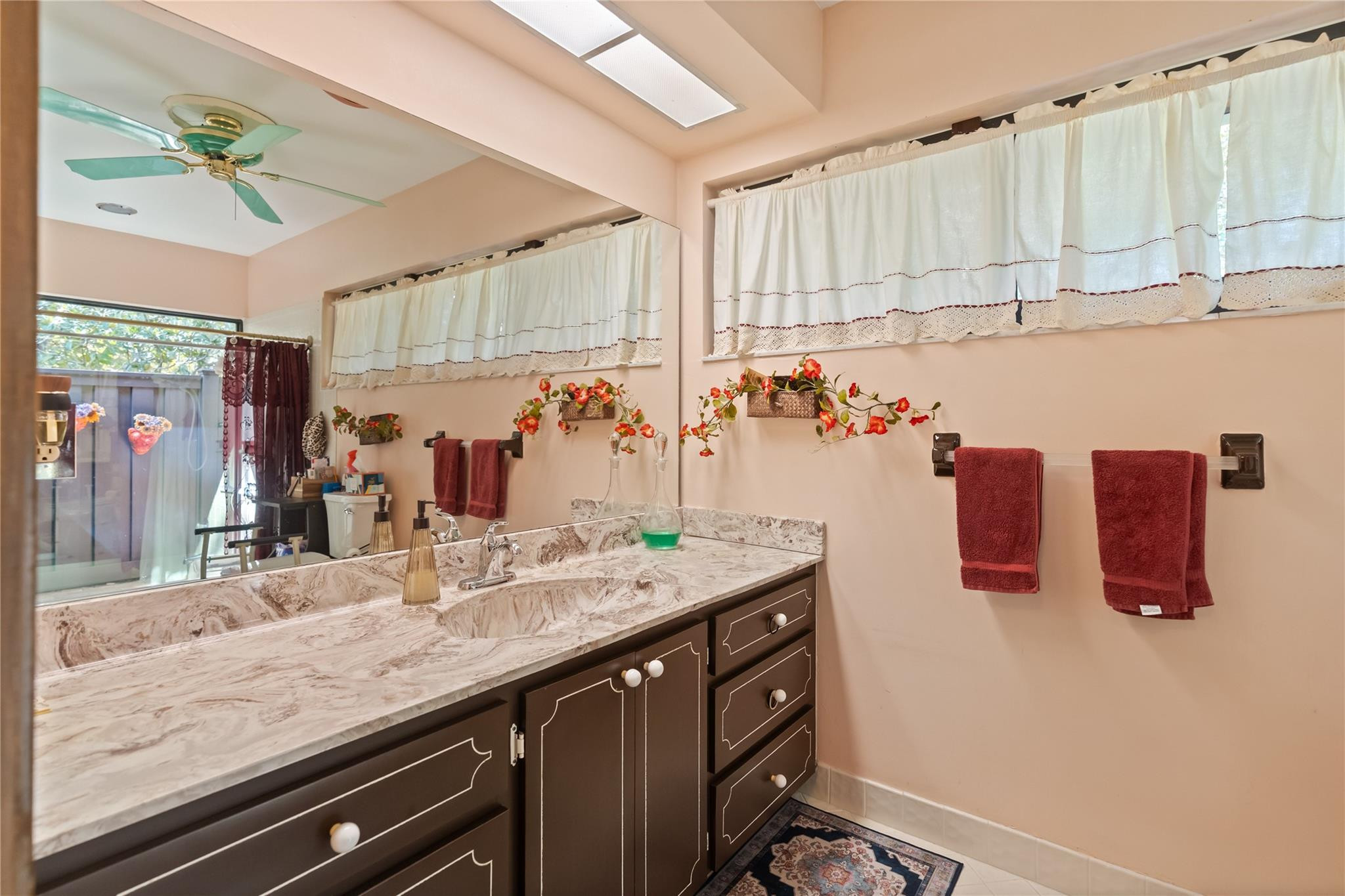 11326 Sundance Lane Boca Raton, FL 33428 - Photo 28 of 49 a kitchen with a sink and a refrigerator