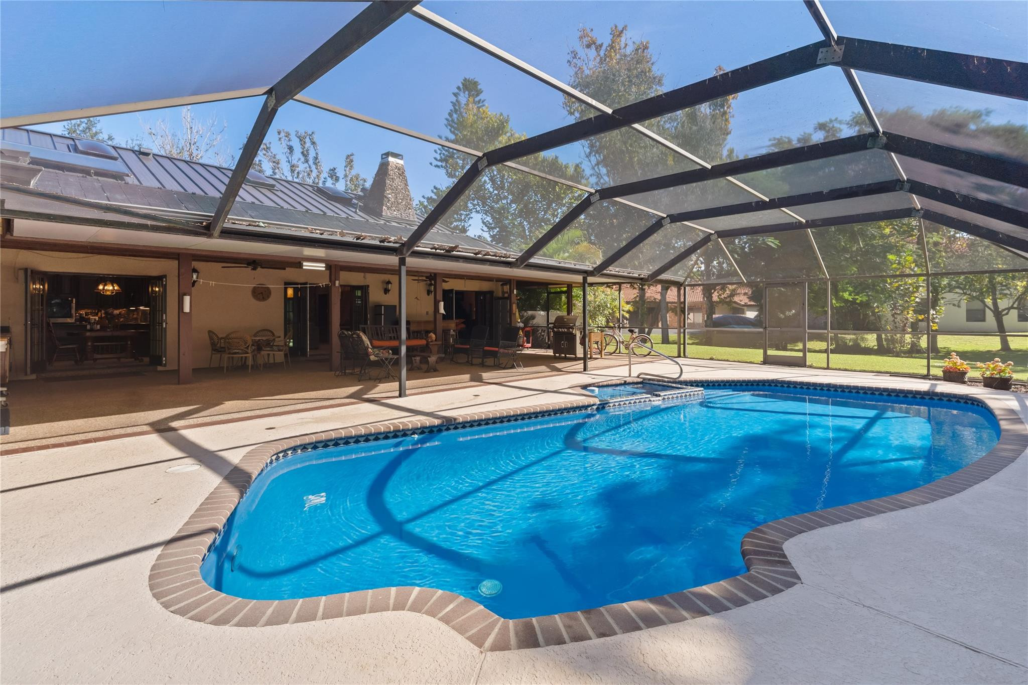 11326 Sundance Lane Boca Raton, FL 33428 - Photo 33 of 49 a view of a swimming pool with a patio