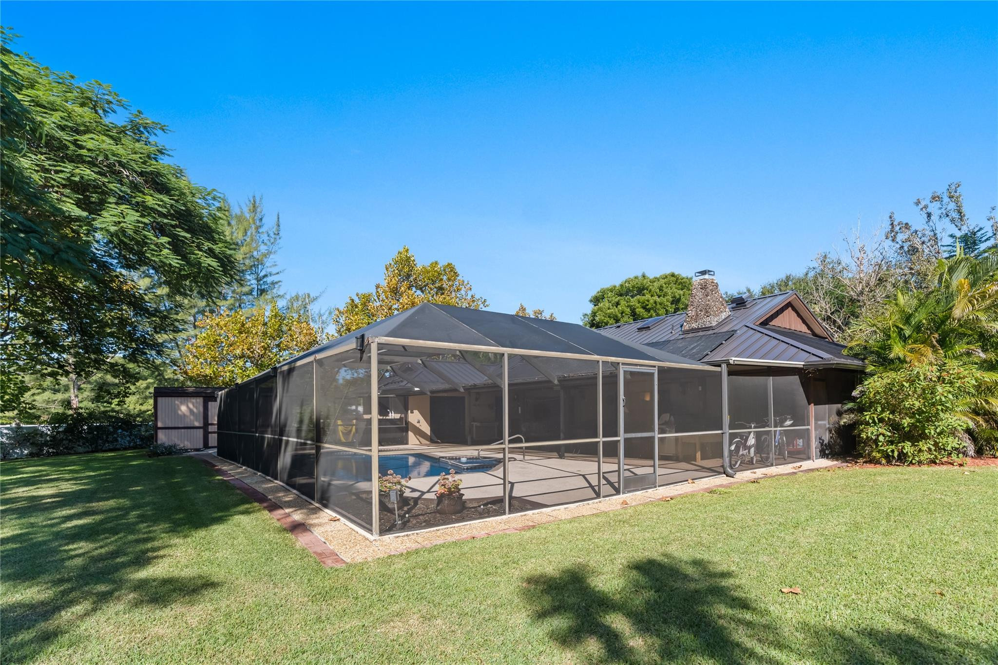 11326 Sundance Lane Boca Raton, FL 33428 - Photo 36 of 49 a view of a house with backyard and porch