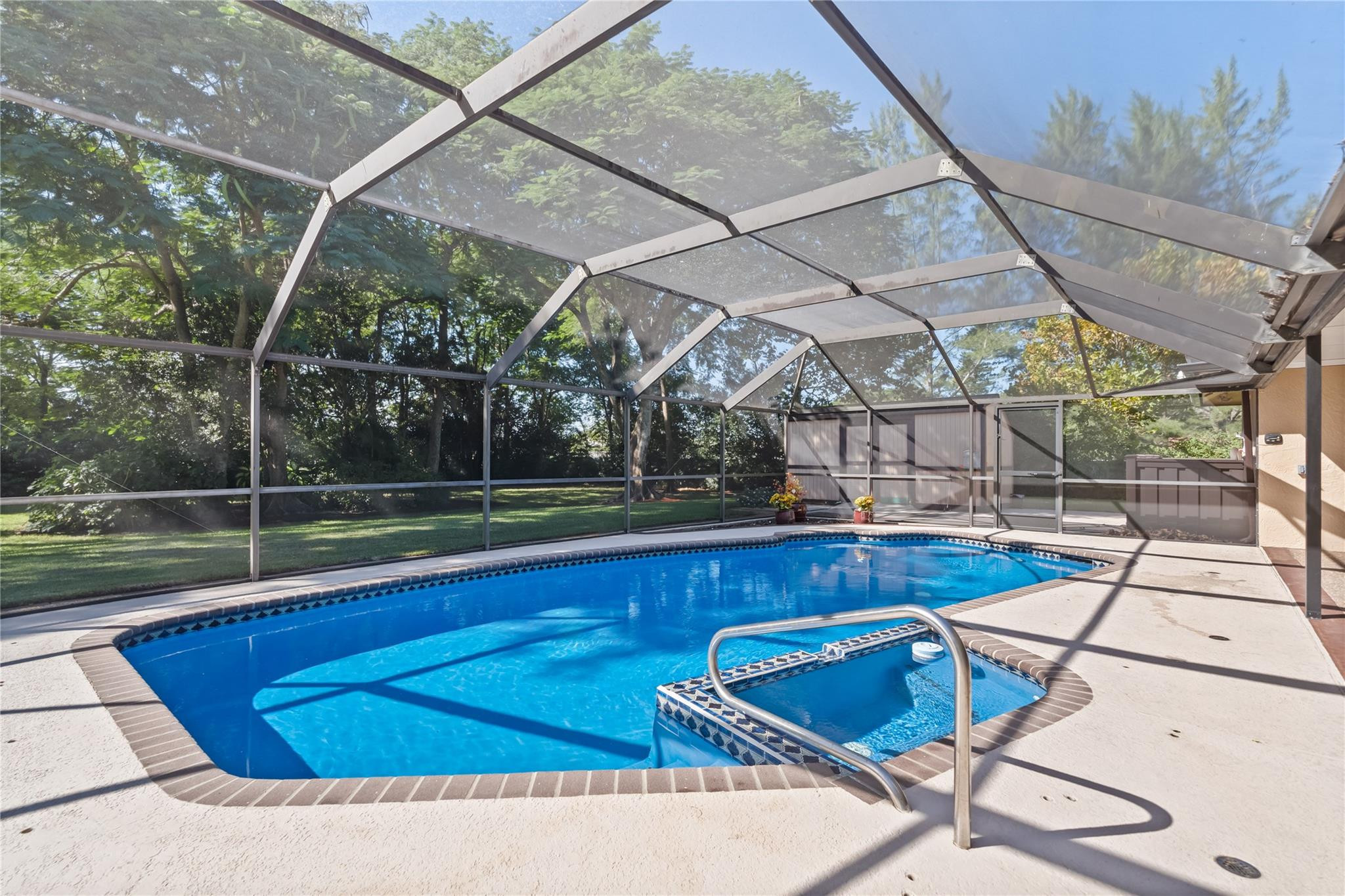 11326 Sundance Lane Boca Raton, FL 33428 - Photo 5 of 49 a view of swimming pool with chairs in patio