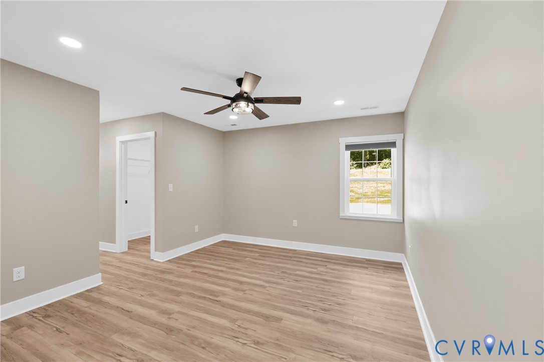 11905 Quaker Road Dinwiddie, VA 23841 - Photo 18 of 34 Wood-finish flooring, recessed lighting, and a cei