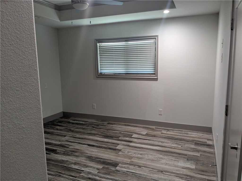 5375 County Road 73A, Unit C55 Robstown, TX 78380 - Photo 5 of 10 a view of an empty room with a window