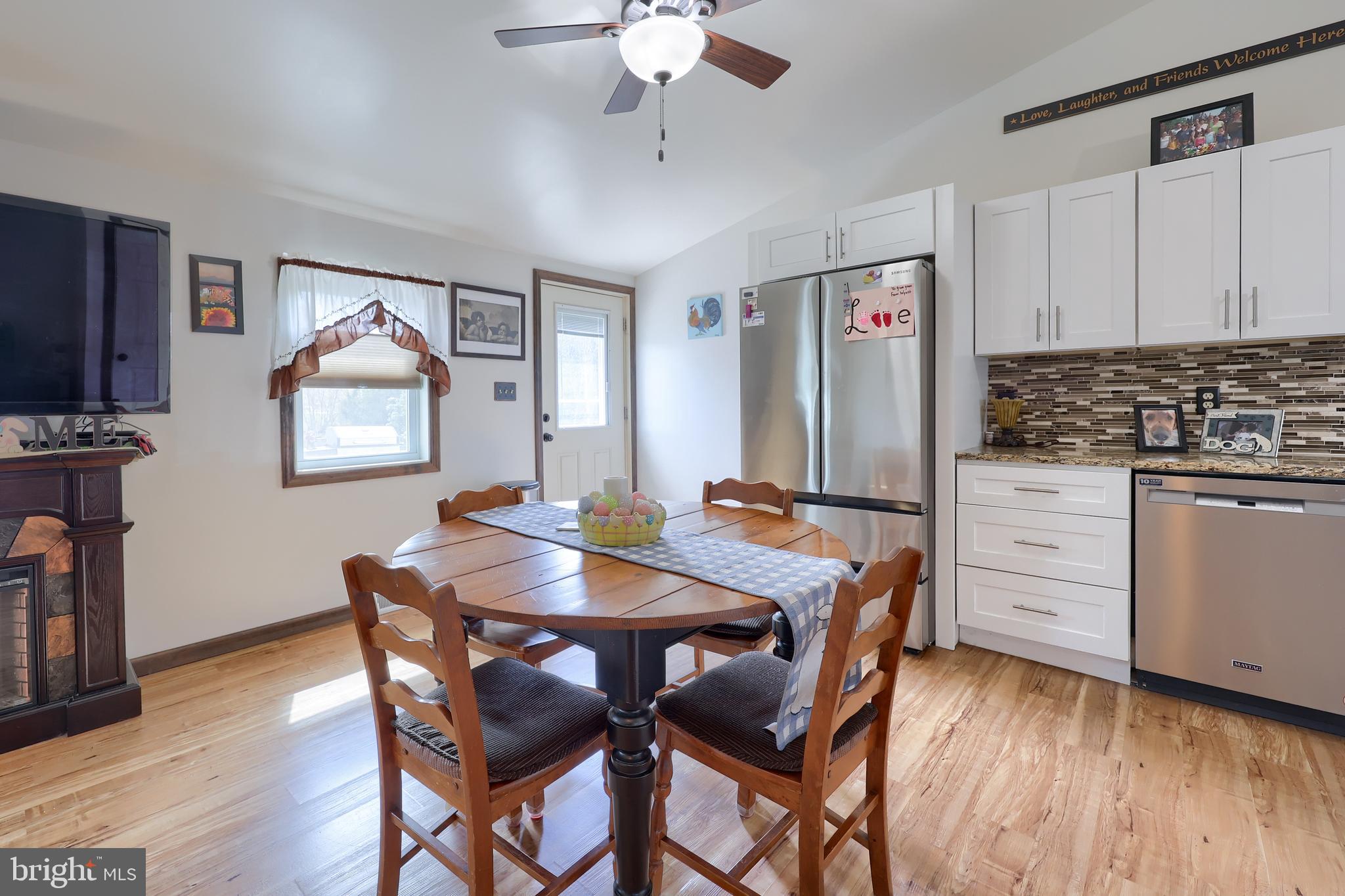 264 Noble Street Lititz, PA 17543 - Photo 8 of 28 a view of a dining room with furniture and wooden floor