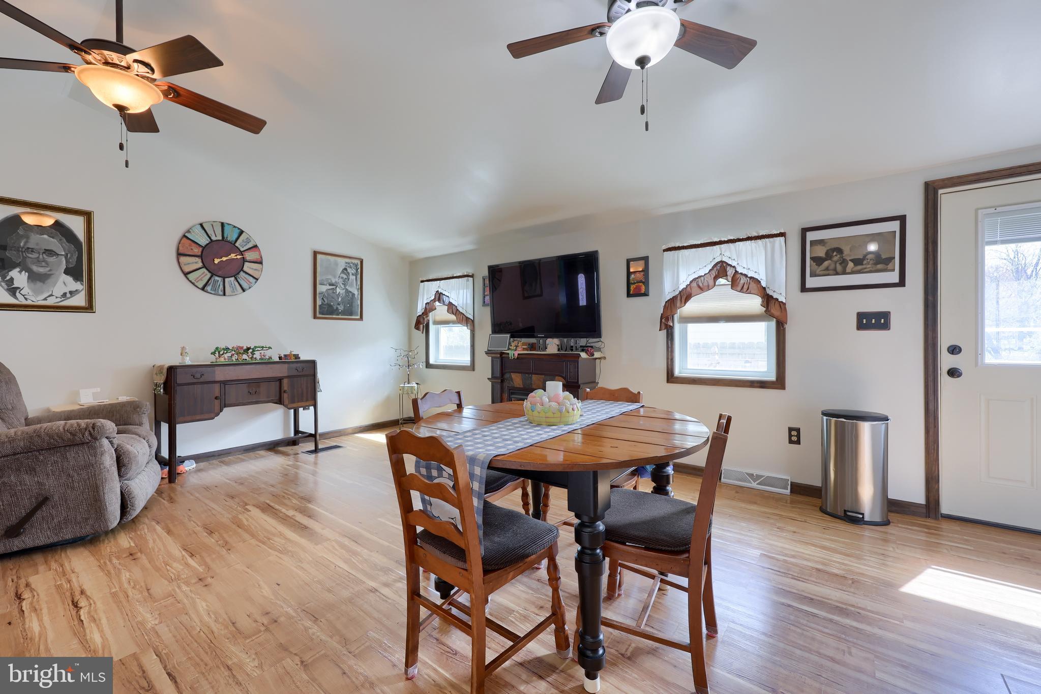 264 Noble Street Lititz, PA 17543 - Photo 9 of 28 a view of a dining room with furniture and wooden floor