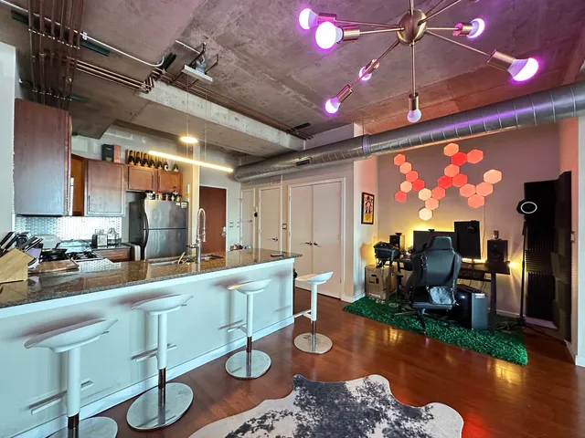 a large room with lots of gym equipment