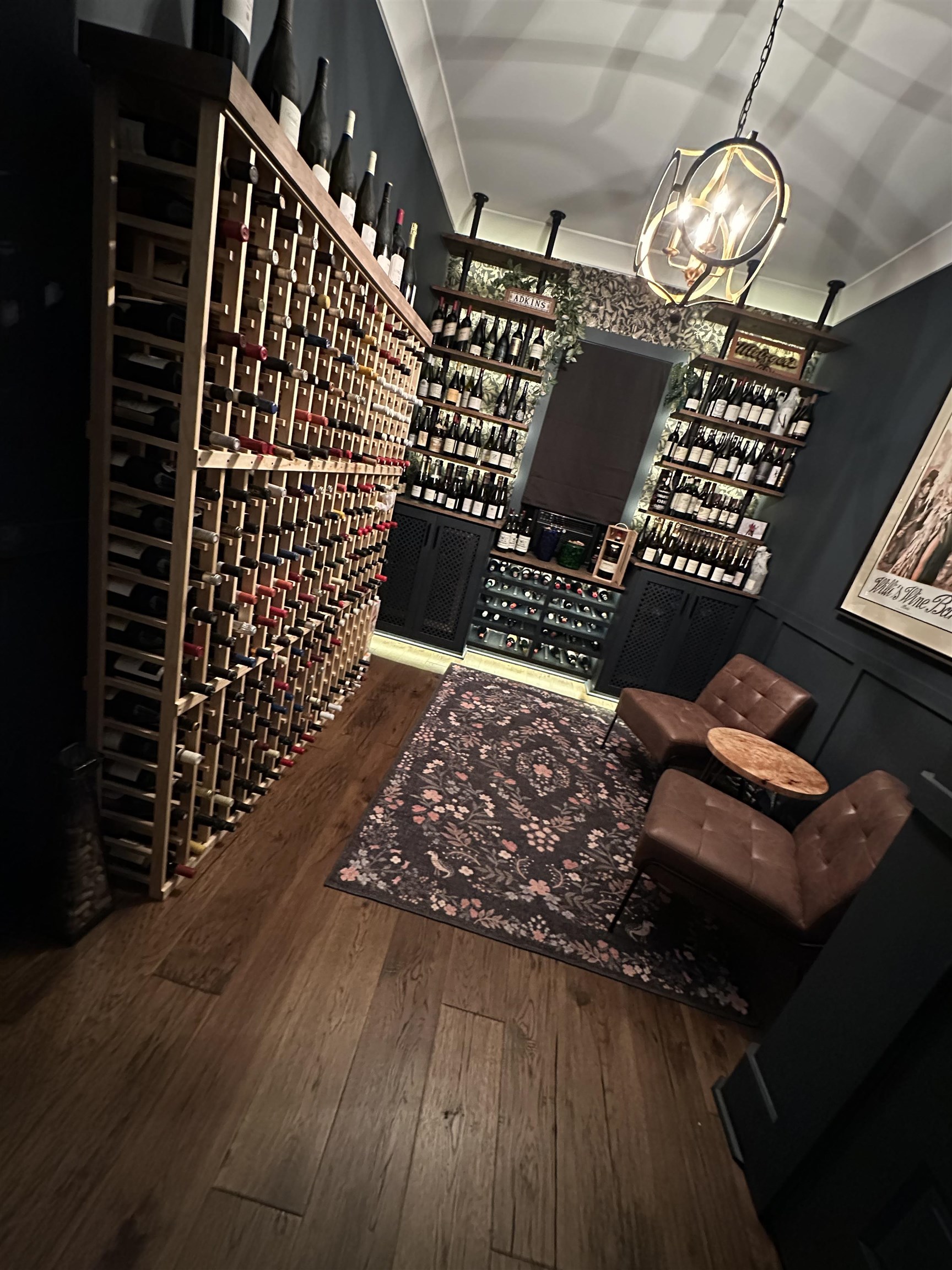 1133 Hayne Road Memphis, TN 38119 - Photo 12 of 34 Wine room. Featuring wood finished floors and a chandelier. Window unit for temperature control for bottles. Room as window and closet so can be used as an office or 5th bedroom.